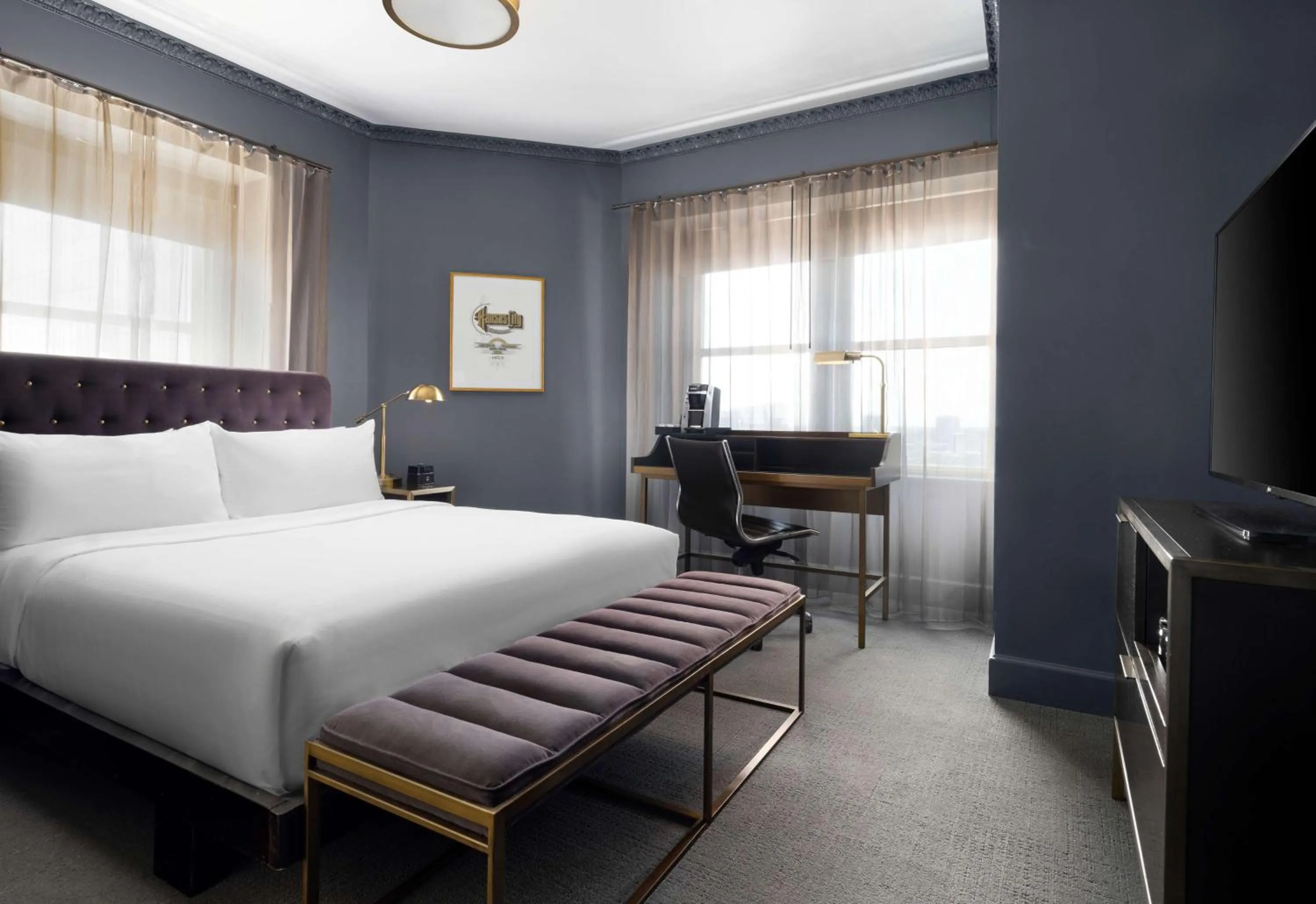 Bed in Hotel Phillips Kansas City, Curio Collection By Hilton