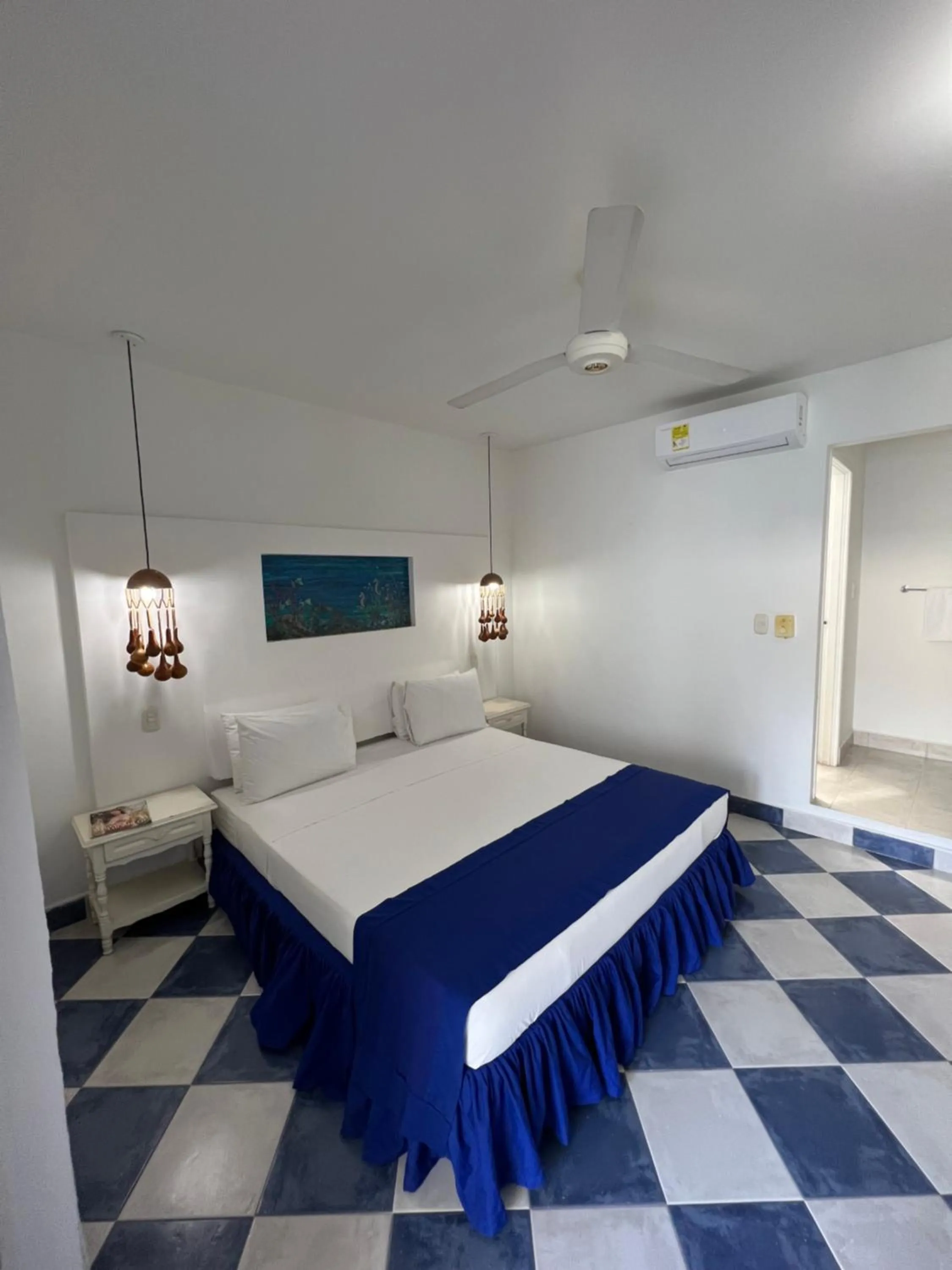 Bed in La Ballena Azul Hotel