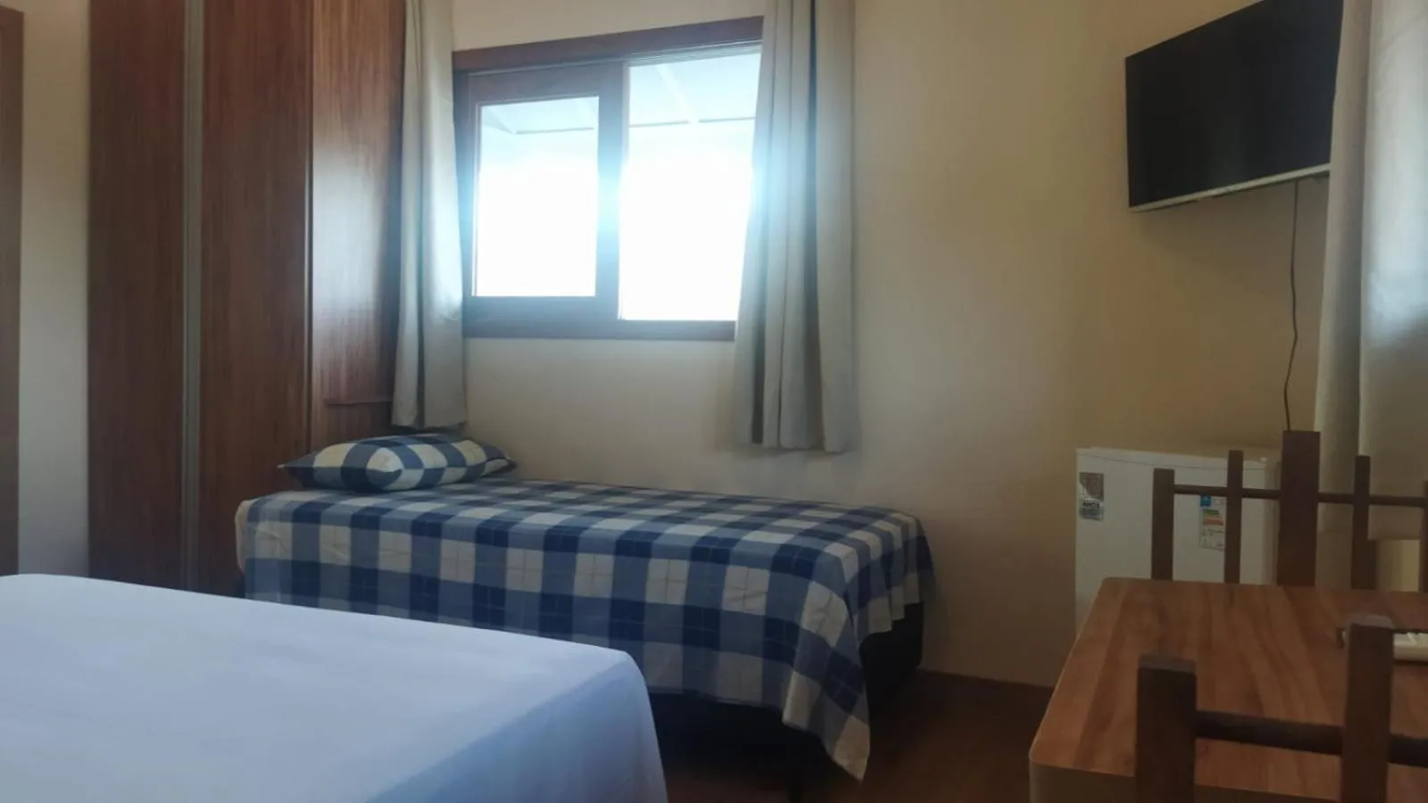 Photo of the whole room, Bed in Pousada Primavera