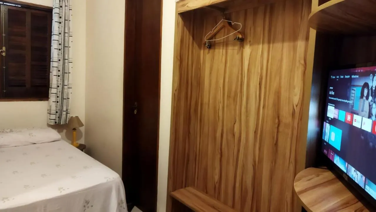 Bed in Pousada Primavera