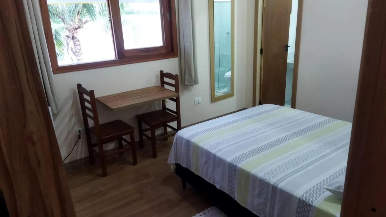 Photo of the whole room, Bed in Pousada Primavera