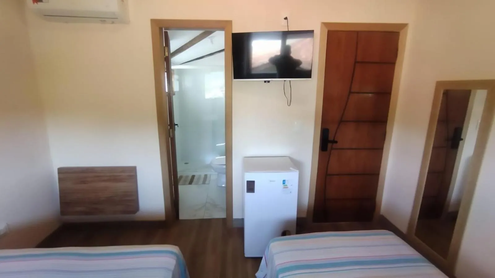 TV and multimedia, Bed in Pousada Primavera