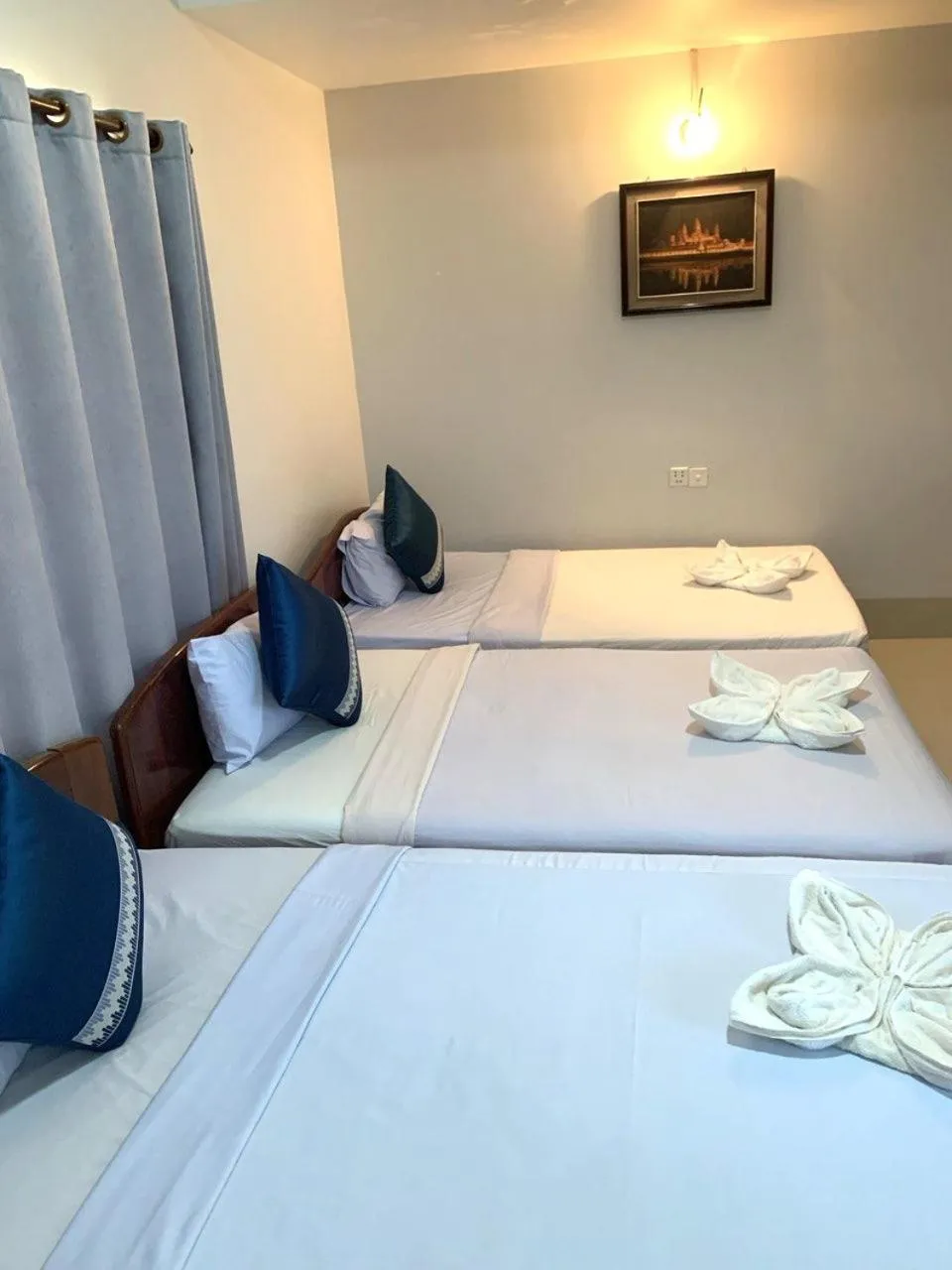 Bed in Siem Reap Riverside Hotel