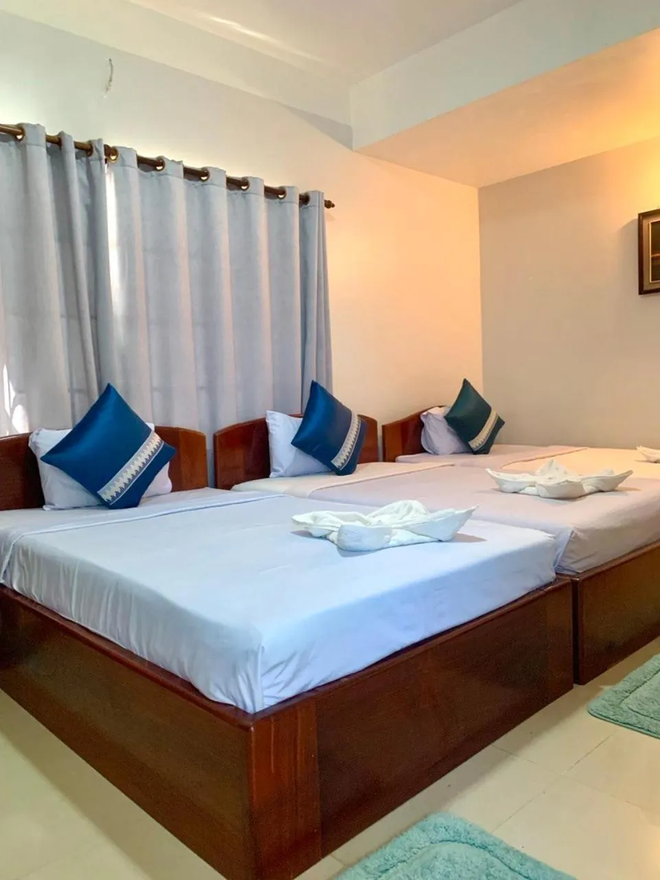 Bed in Siem Reap Riverside Hotel