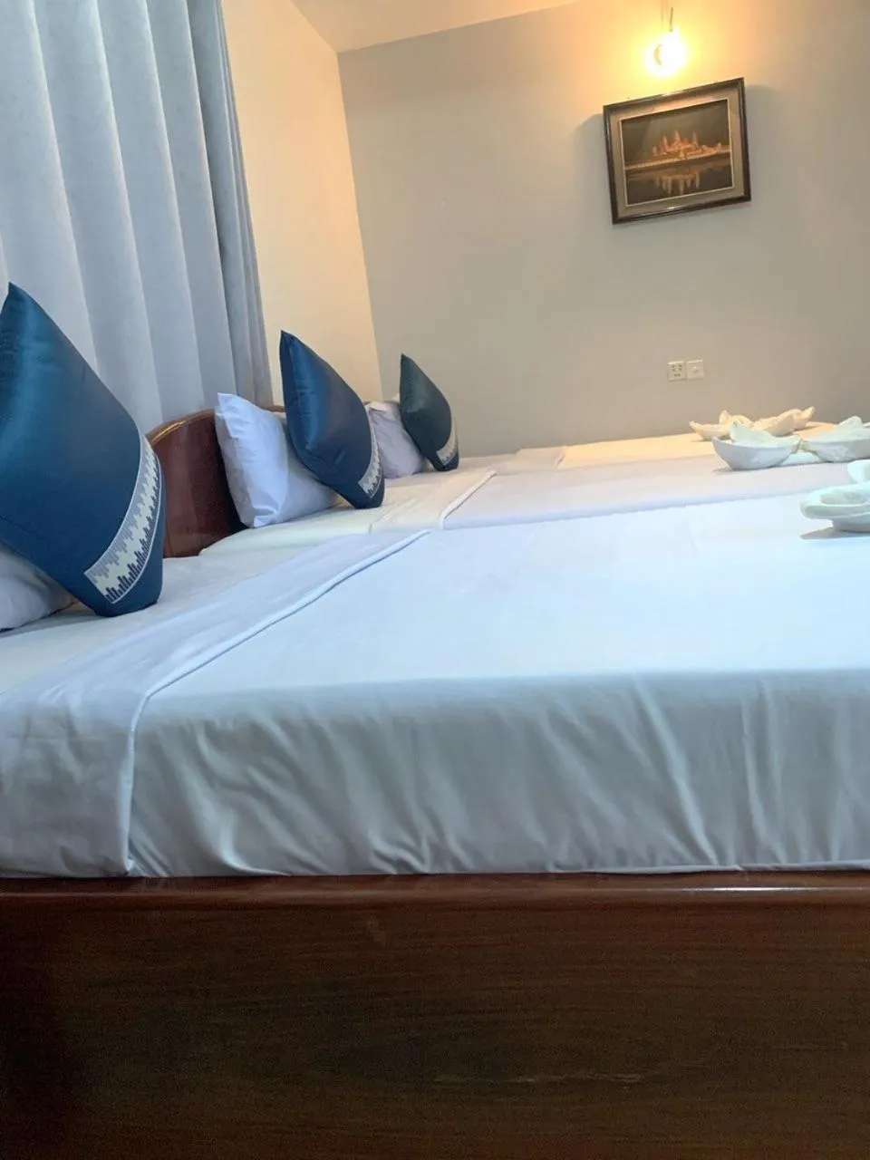 Bed in Siem Reap Riverside Hotel
