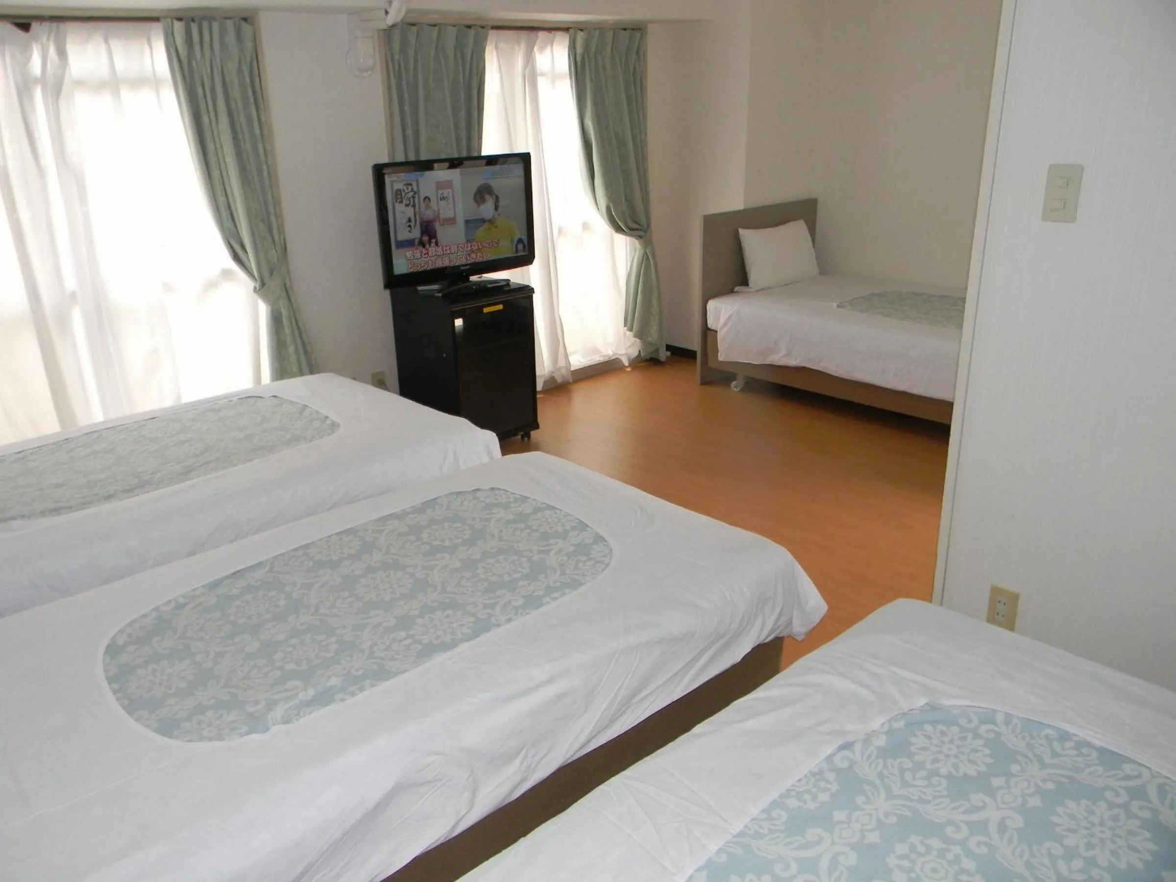 Bedroom, Bed in Weekly Green In Namba