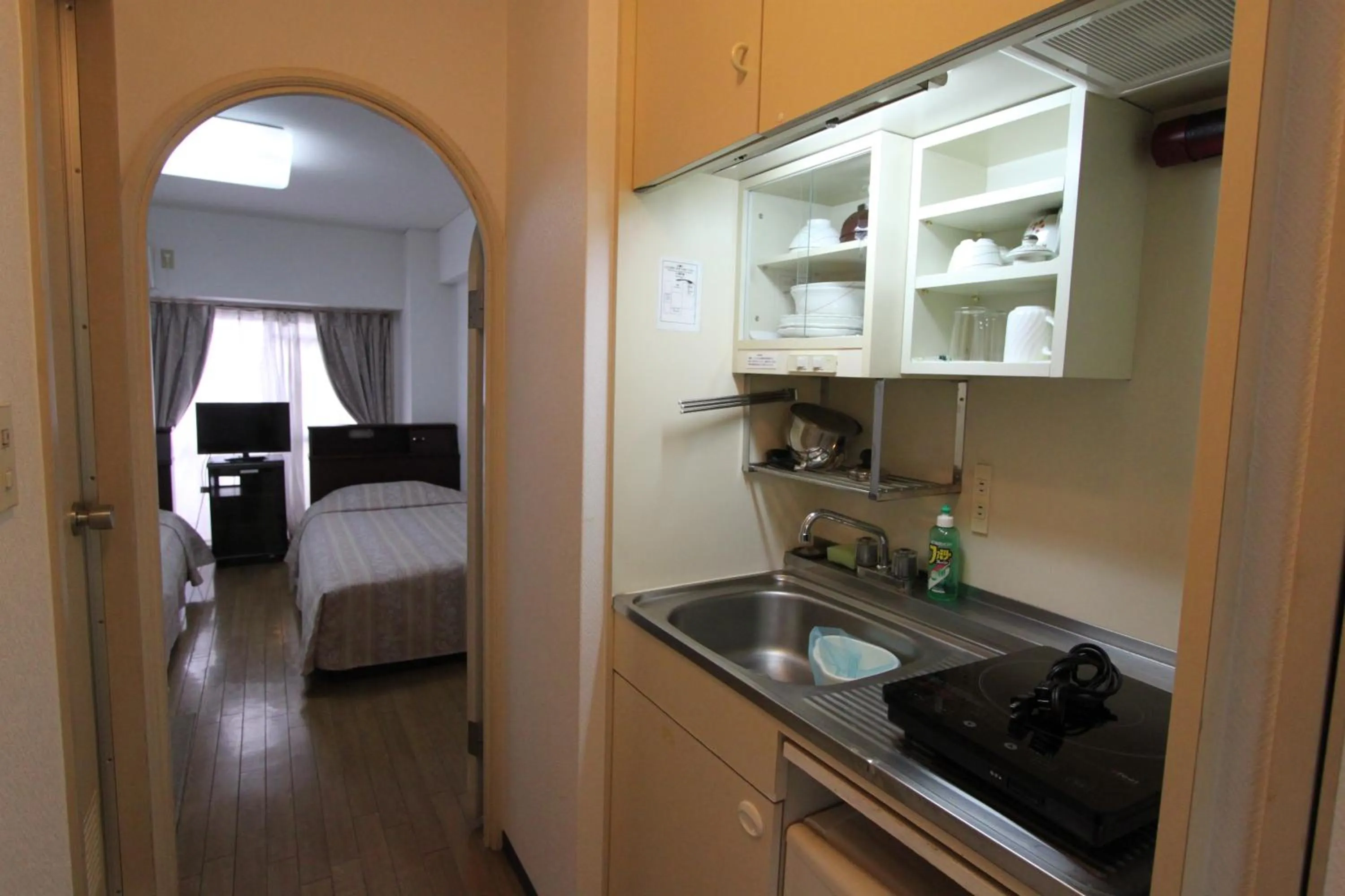 Kitchen or kitchenette, Bed in Weekly Green In Namba