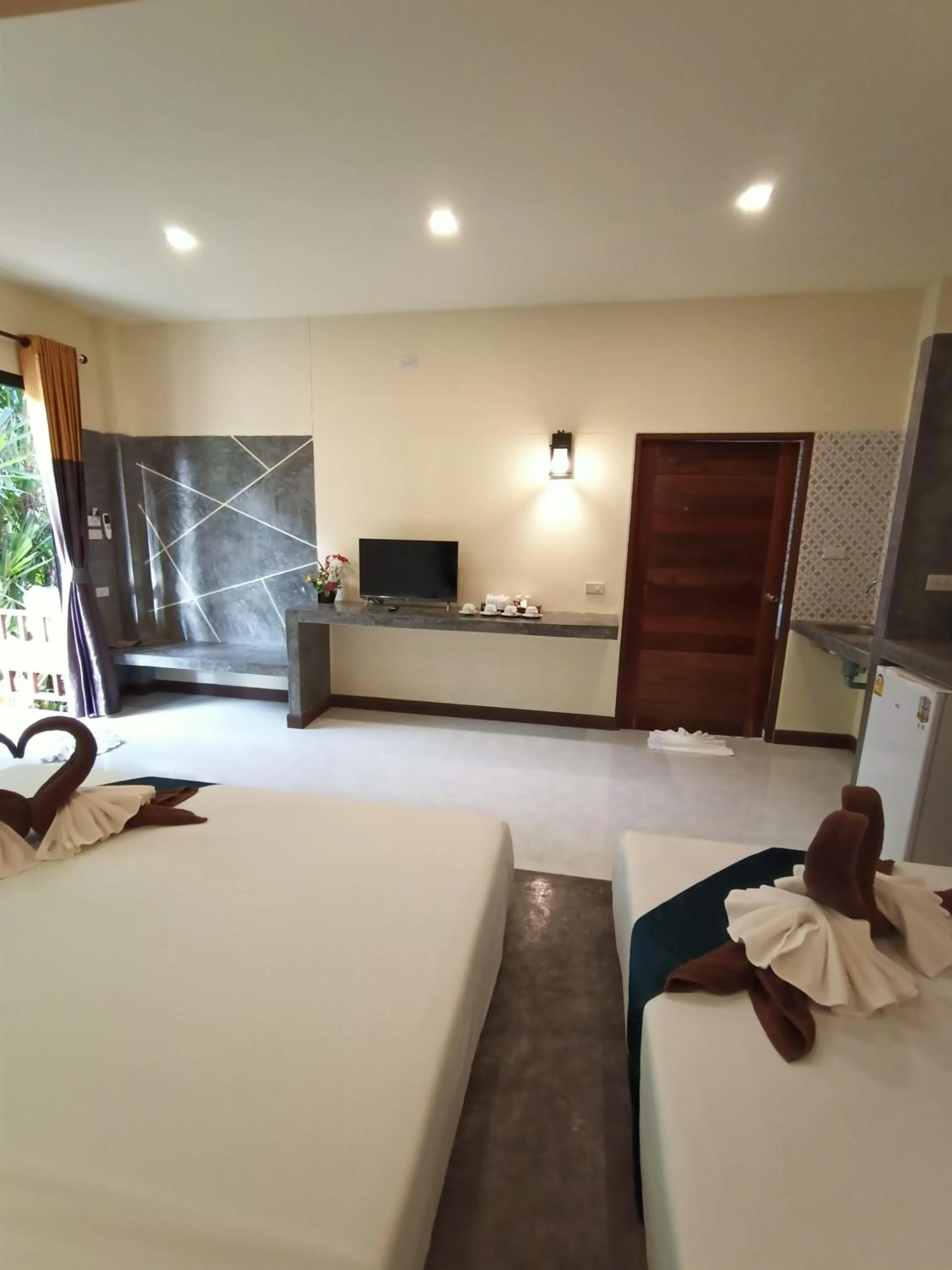 Bed in Lanta Pearl Beach Resort