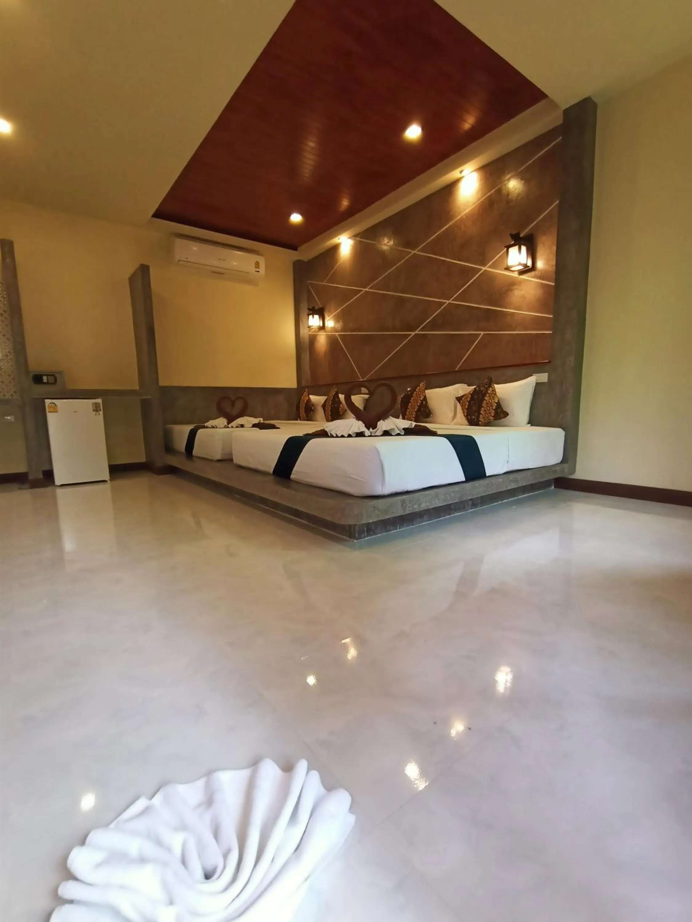 Bed in Lanta Pearl Beach Resort