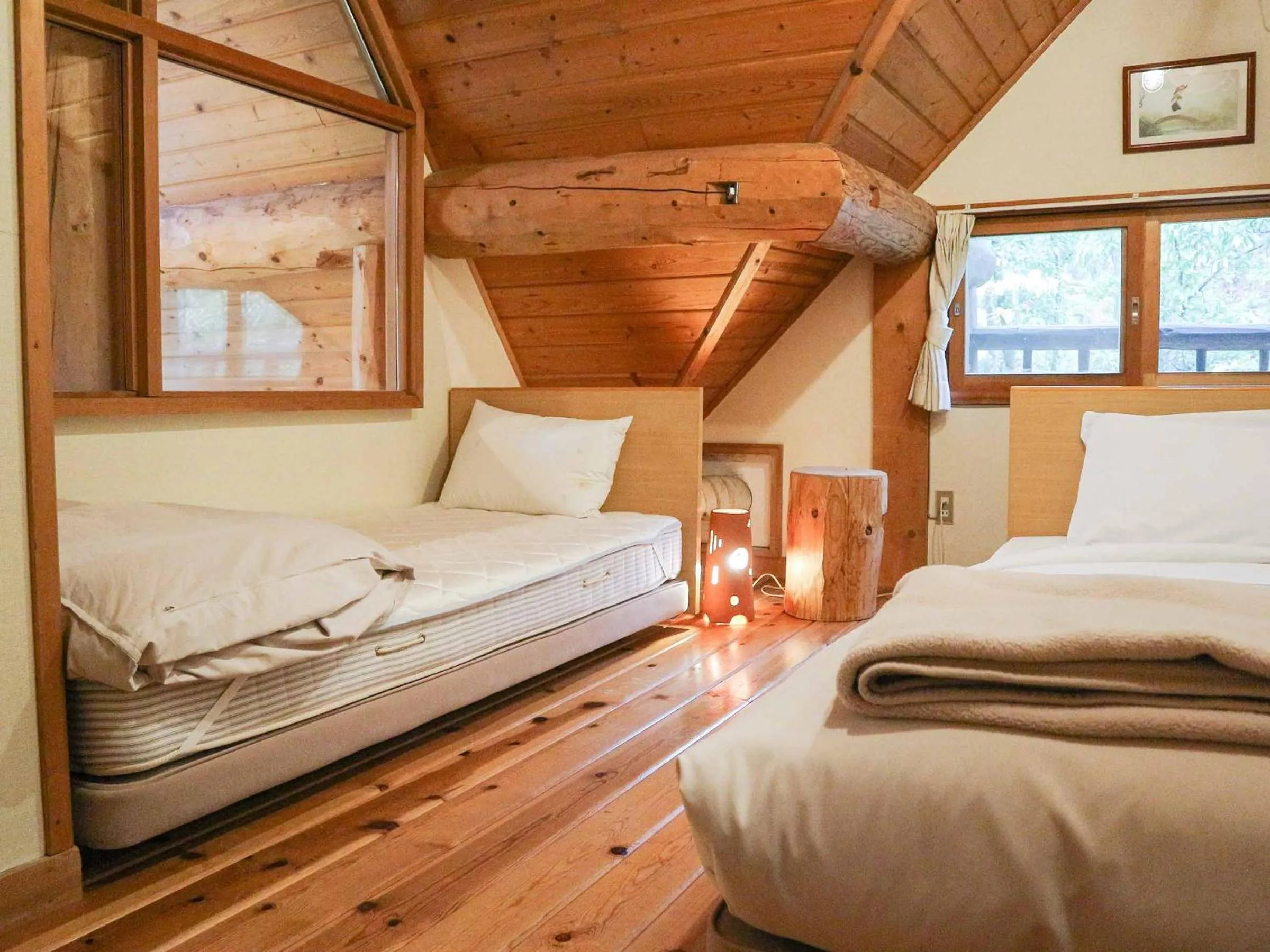 Bed in Canadian Loghouse Inn AzuminoYujin