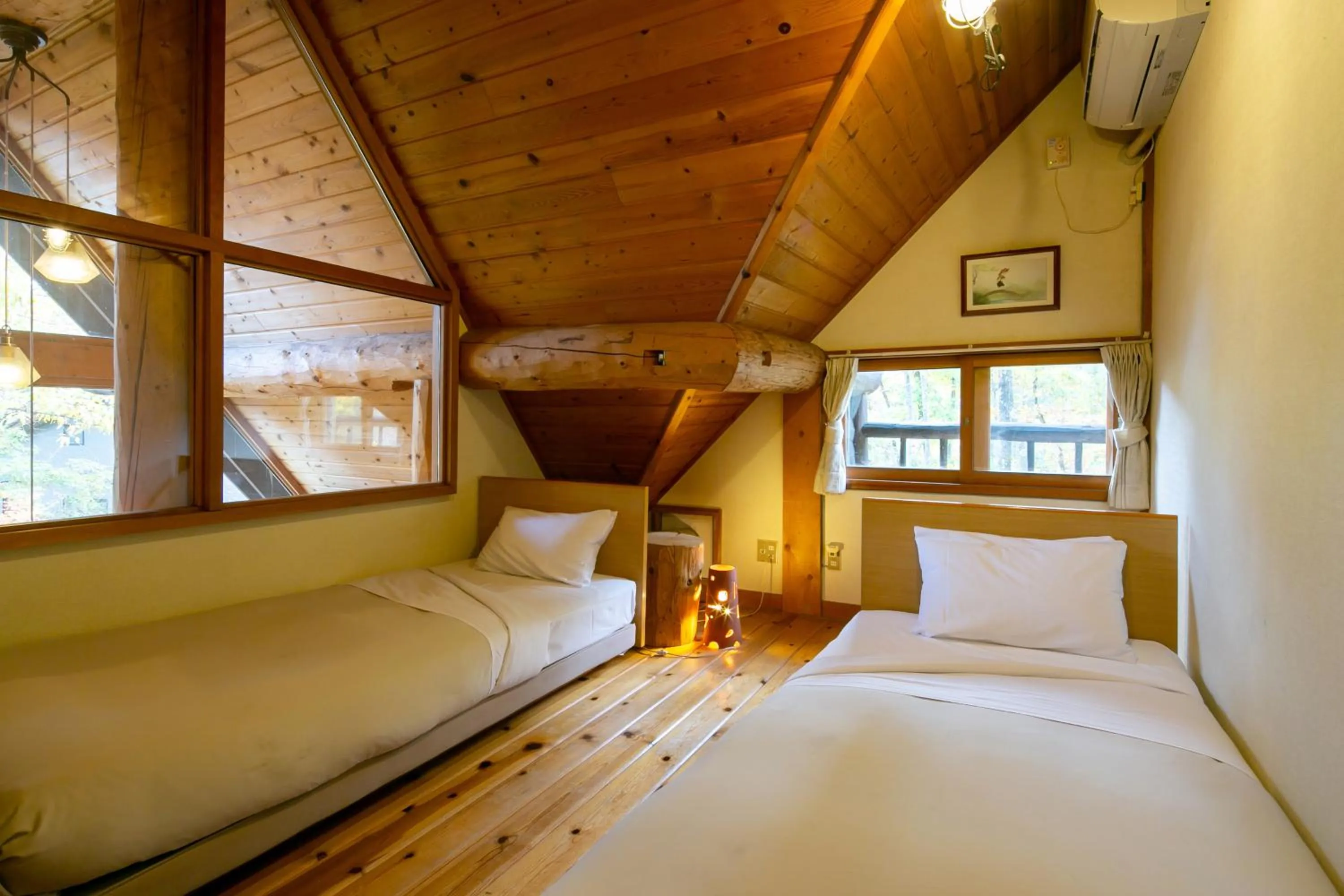 Bed in Canadian Loghouse Inn AzuminoYujin