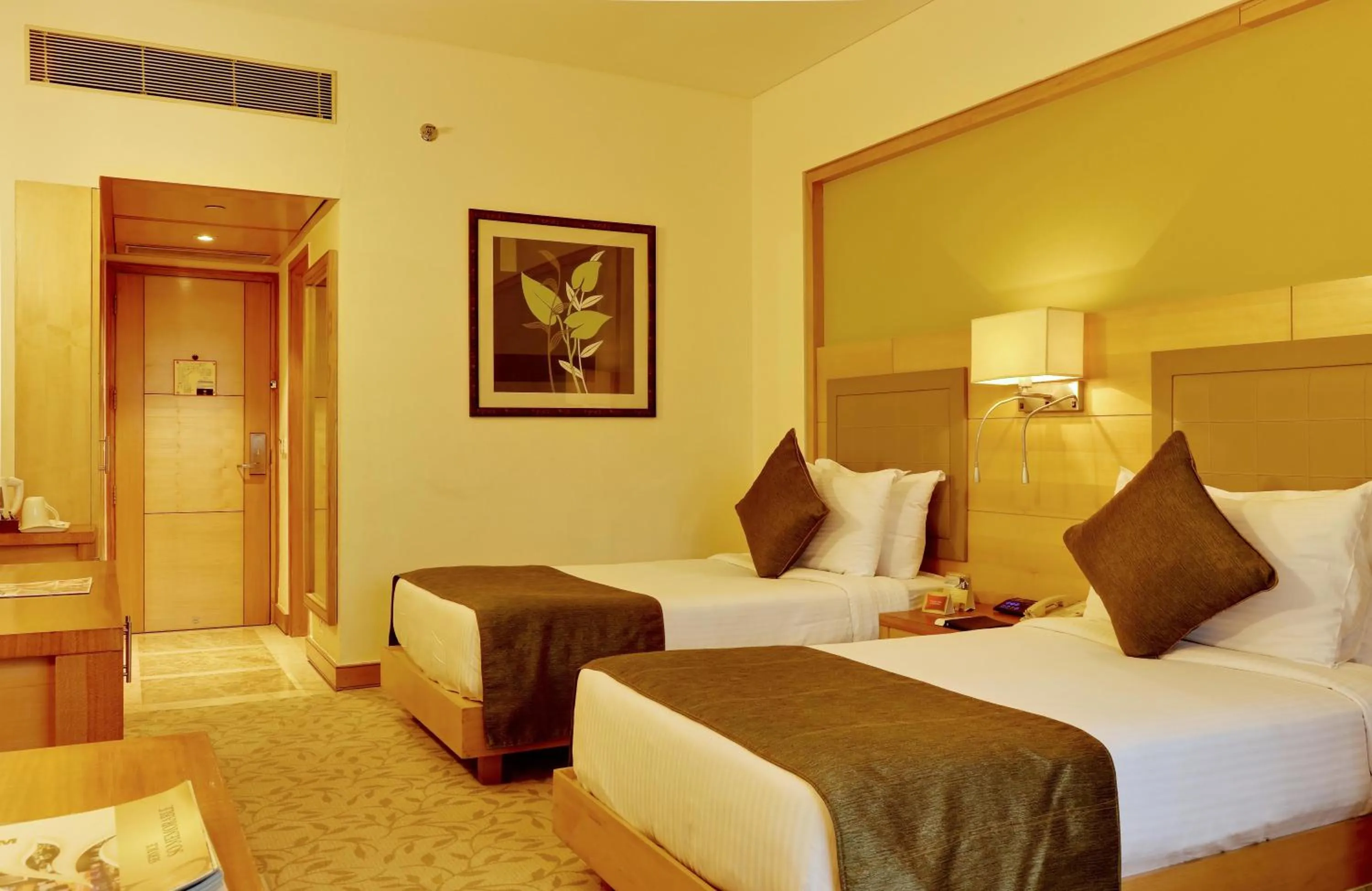 Bed in The Suryaa New Delhi