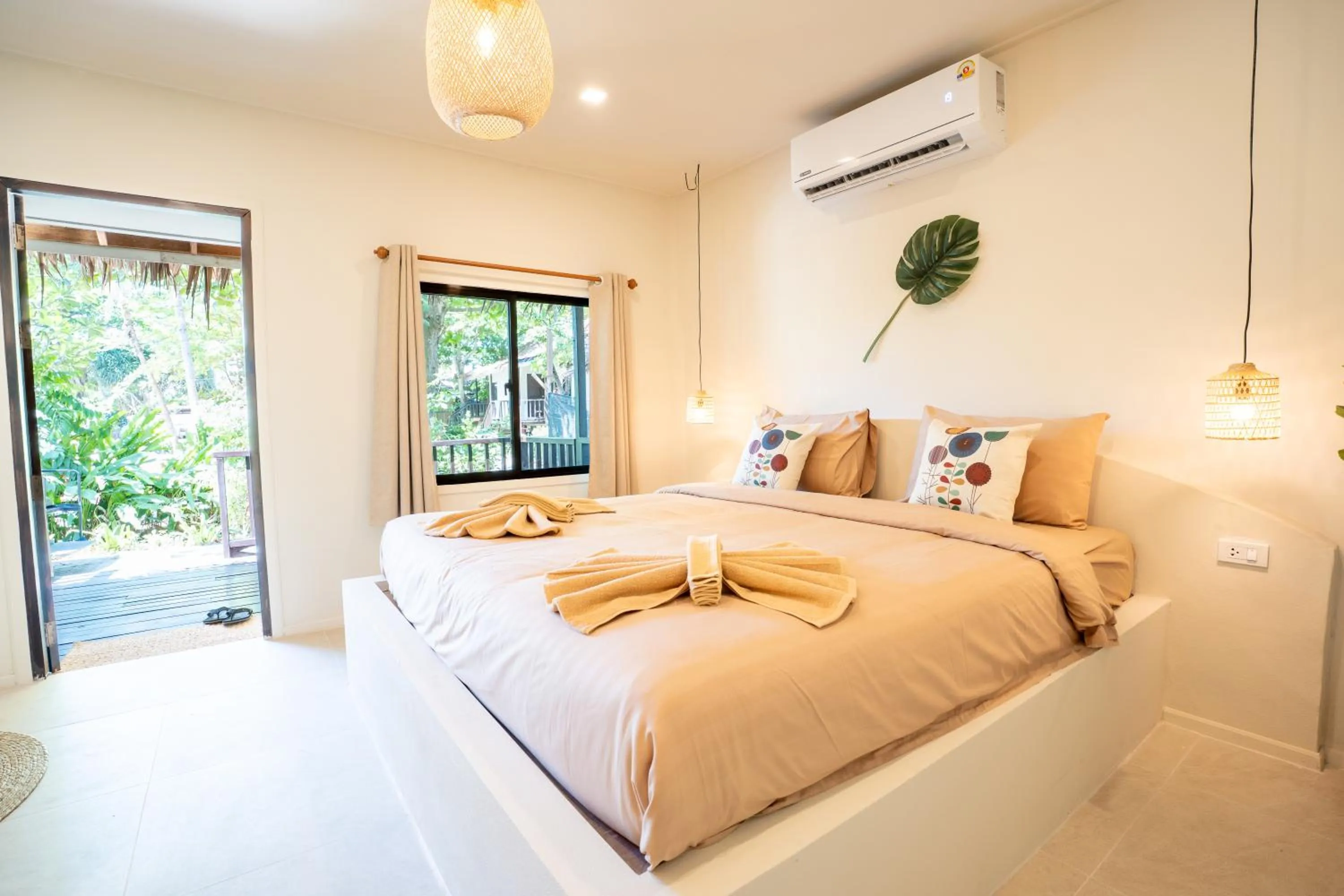 Bed in Relax Bay Beach Resort