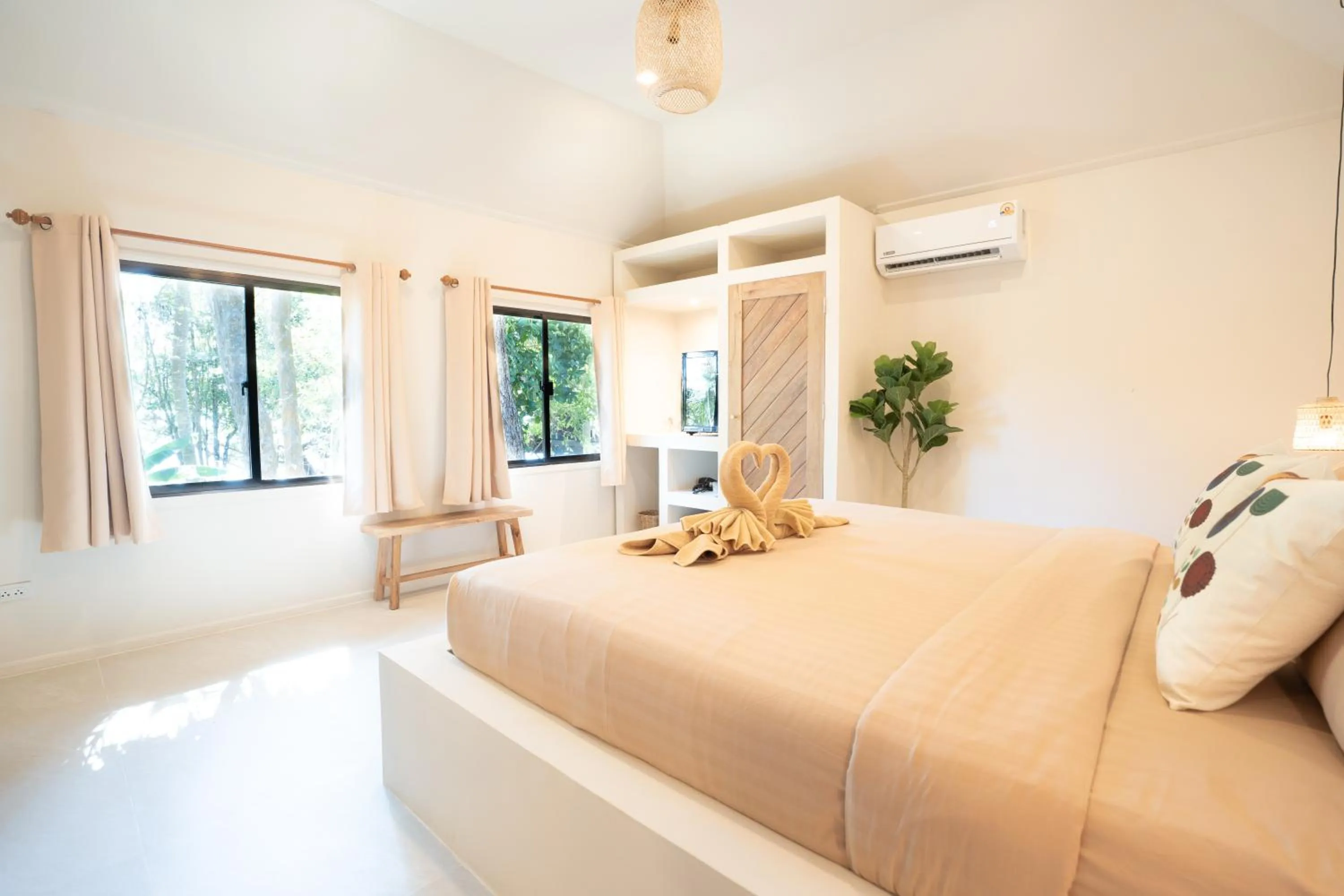 Bed in Relax Bay Beach Resort