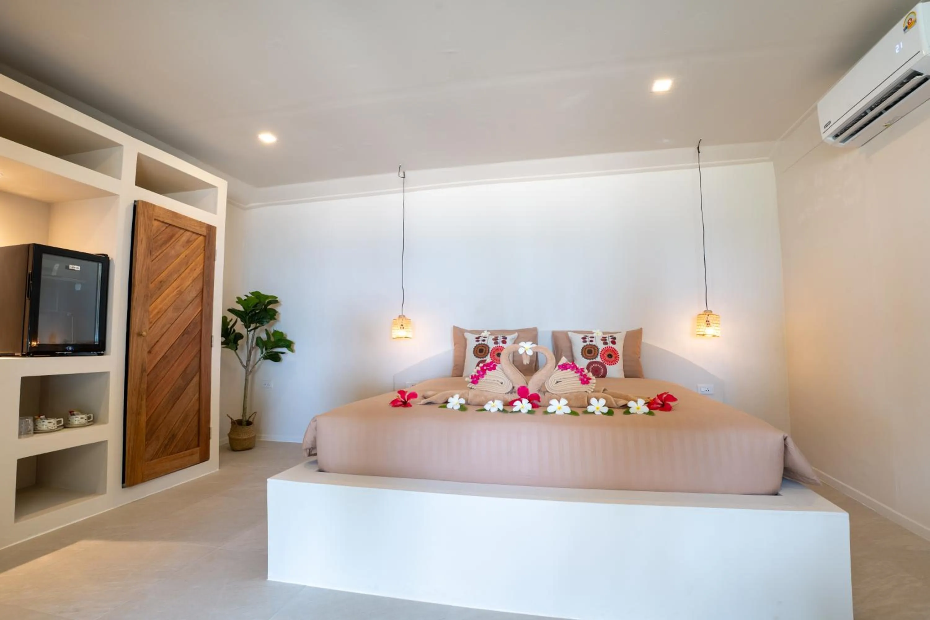 Bed in Relax Bay Beach Resort