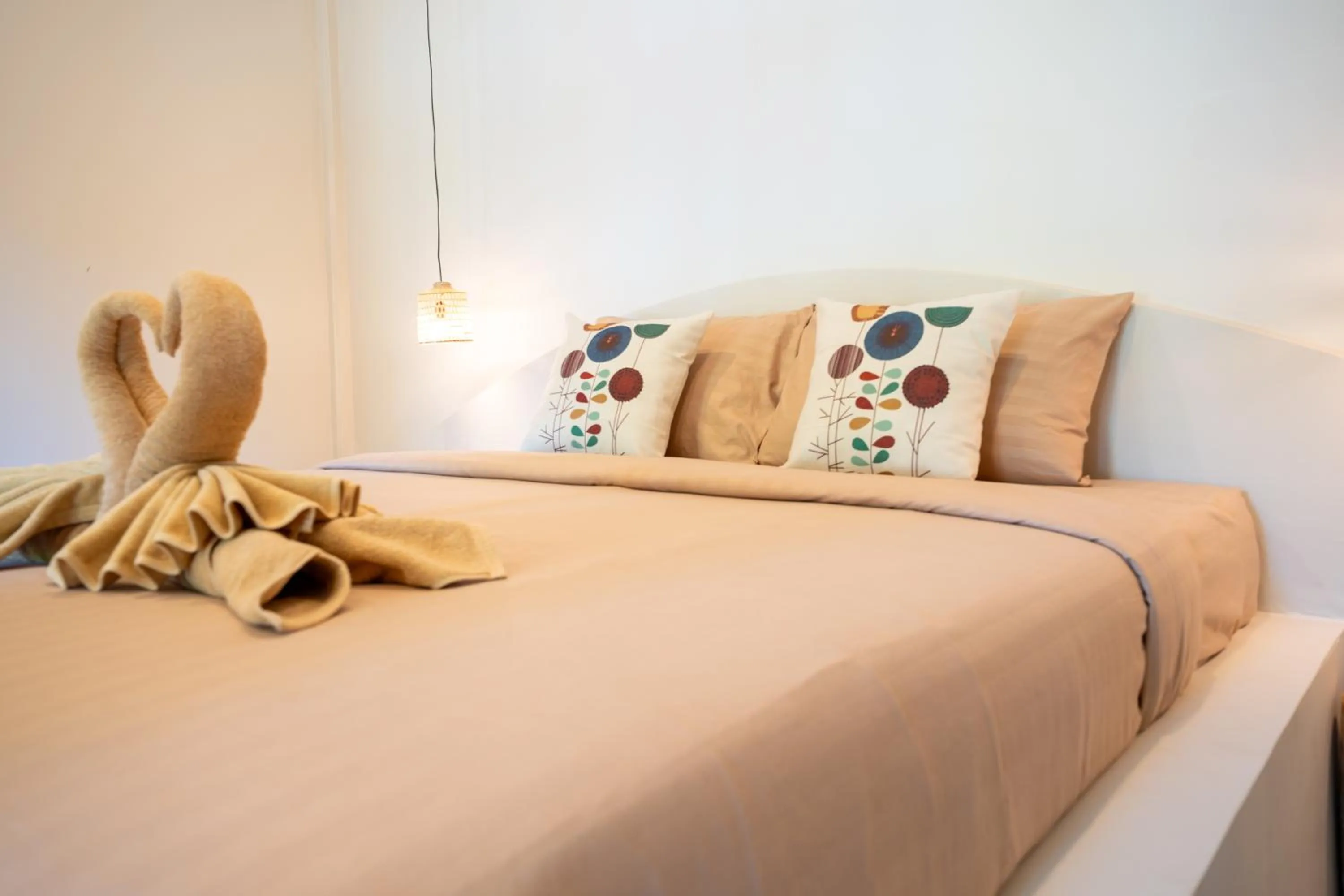 Bed in Relax Bay Beach Resort