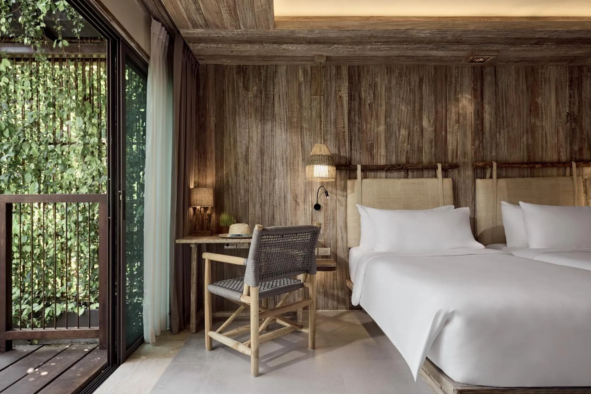 Bed in Dinso Resort & Villas Phuket, Vignette Collection by IHG