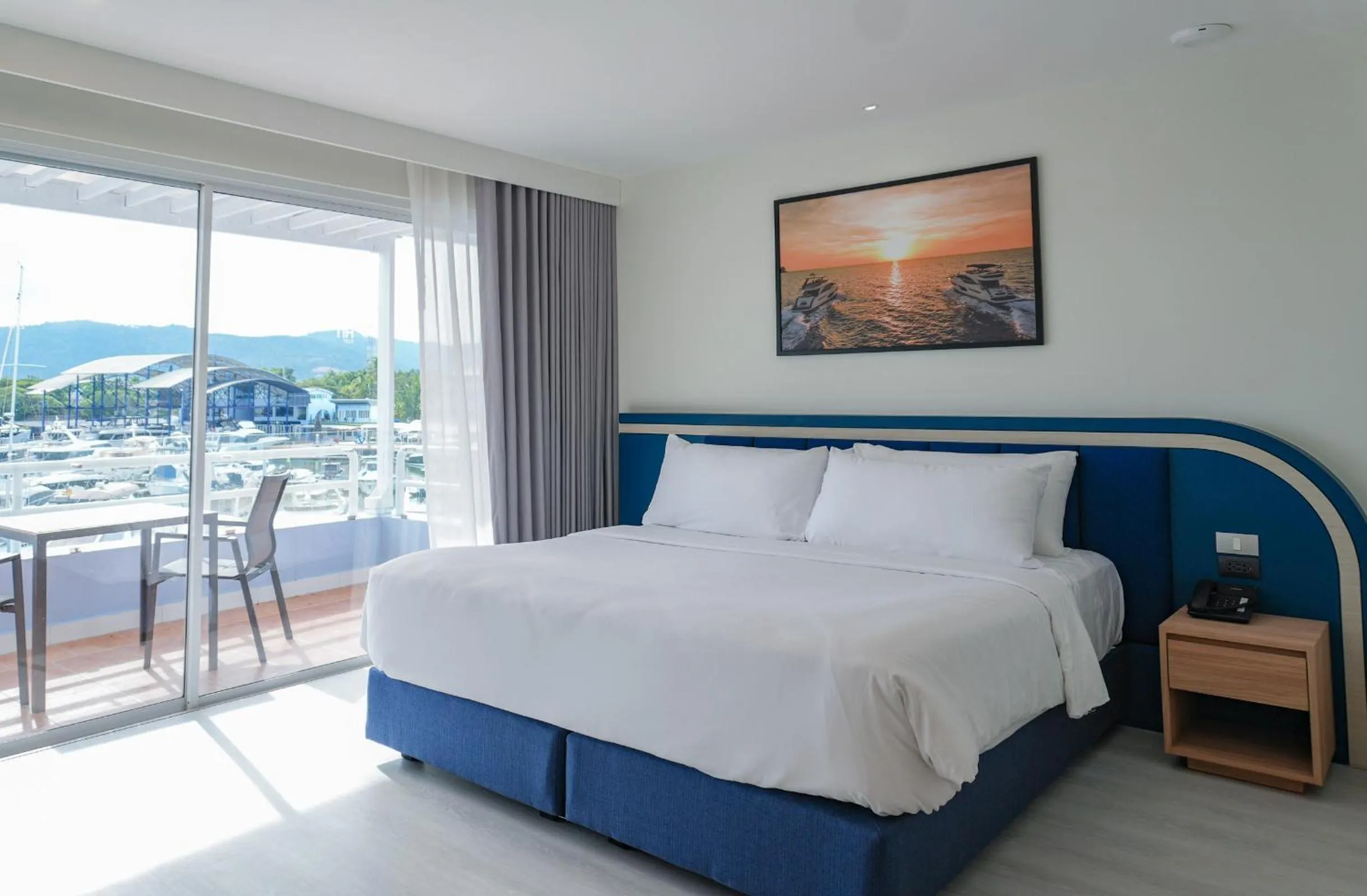 Bed in NH Boat Lagoon Phuket Resort