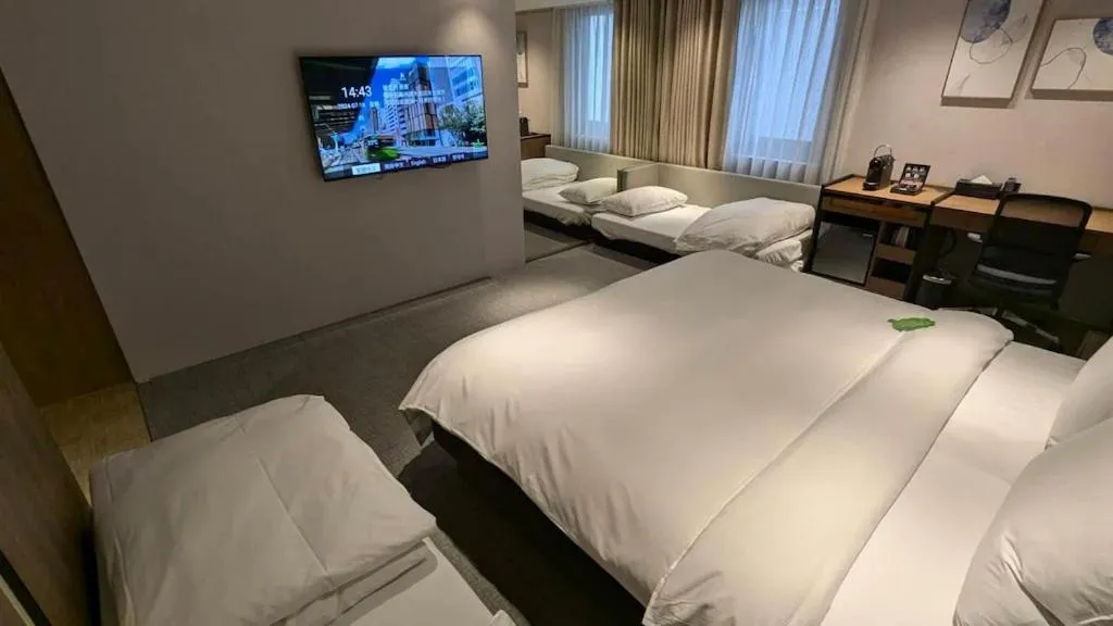 Photo of the whole room, Bed in K Hotel Taipei Nanjing