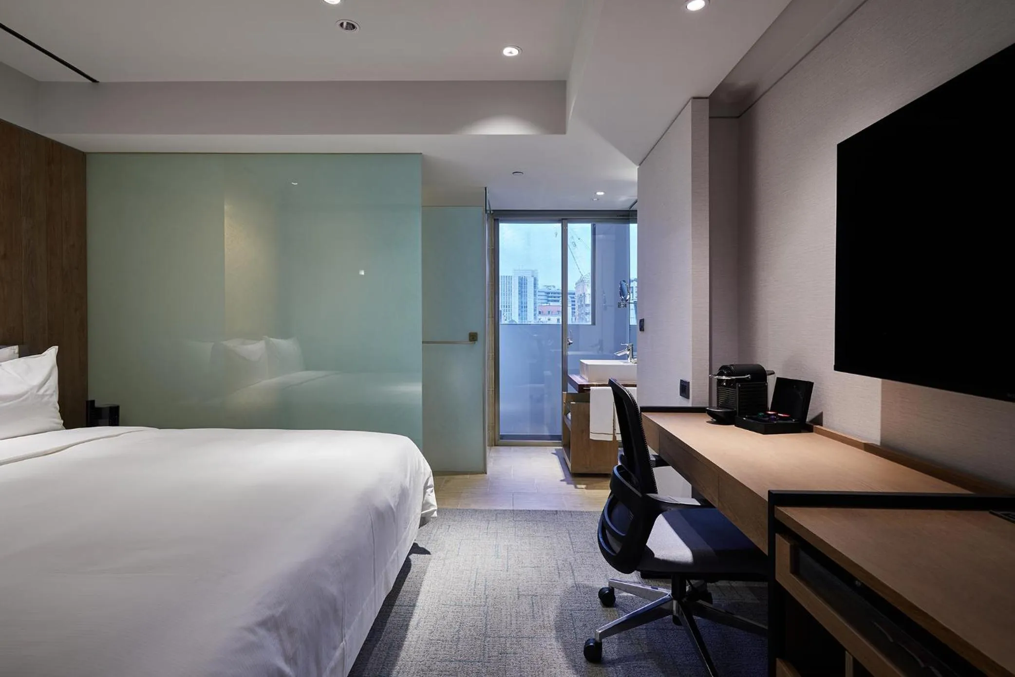 Communal lounge/ TV room, Bed in K Hotel Taipei Nanjing