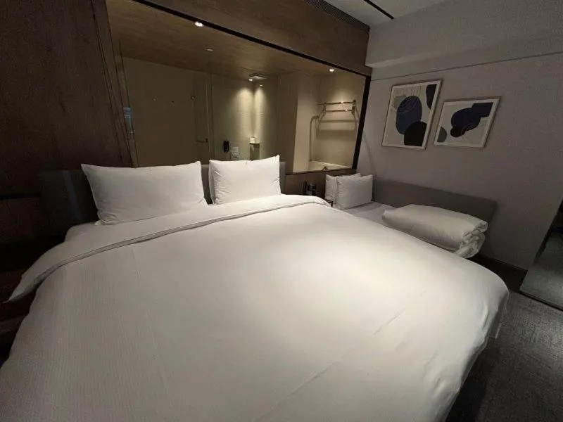 Photo of the whole room, Bed in K Hotel Taipei Nanjing