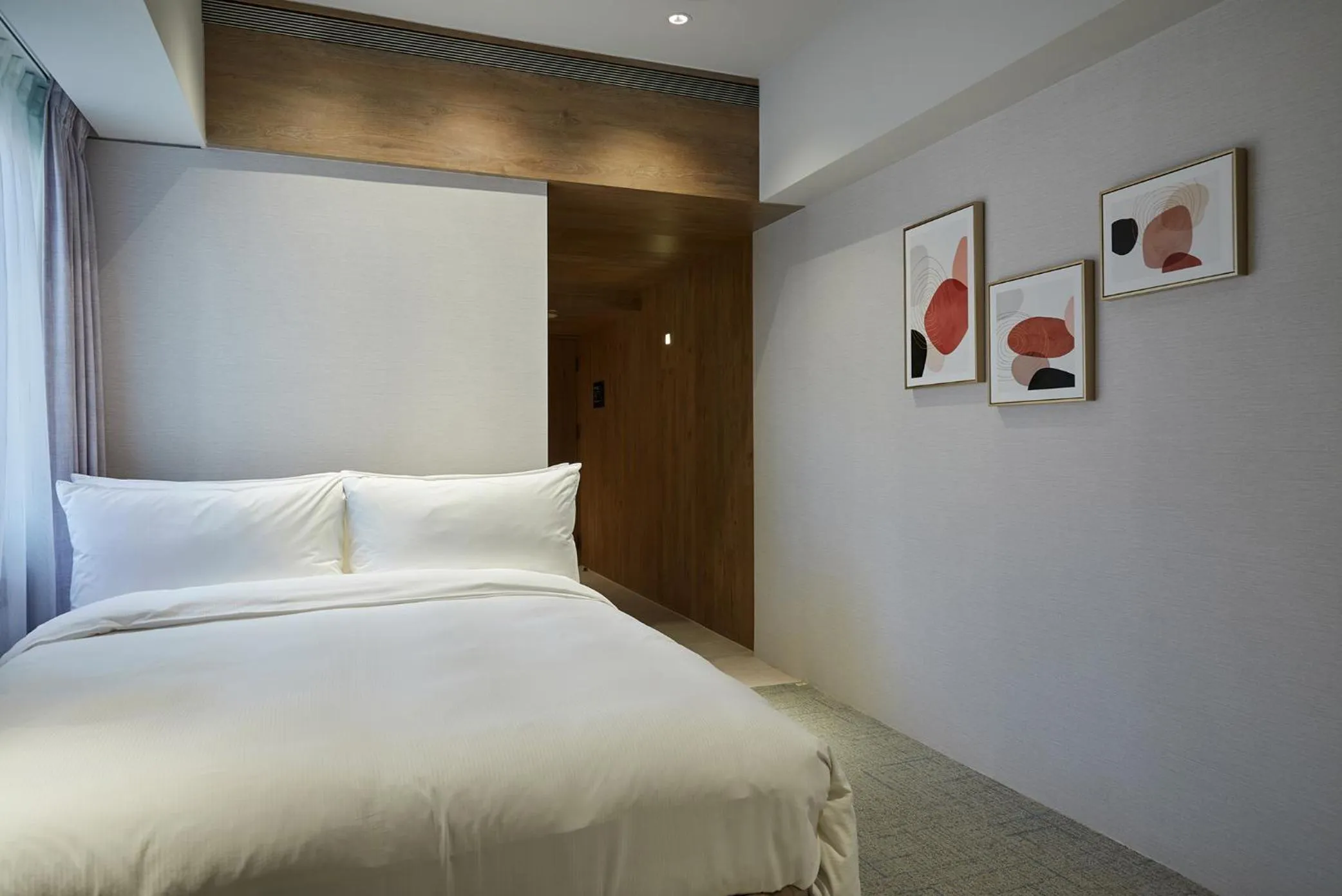 Bed in K Hotel Taipei Nanjing