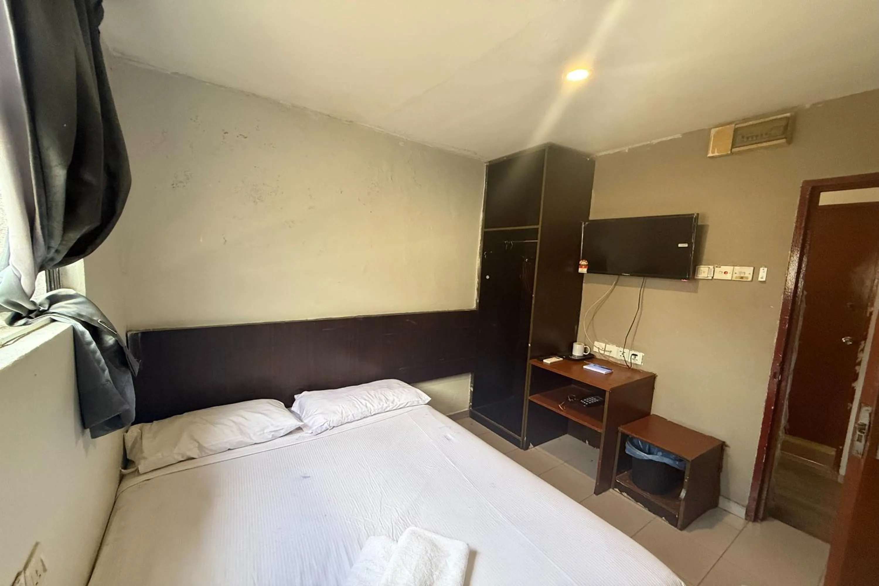 Bed in Tiong Nam Hotel