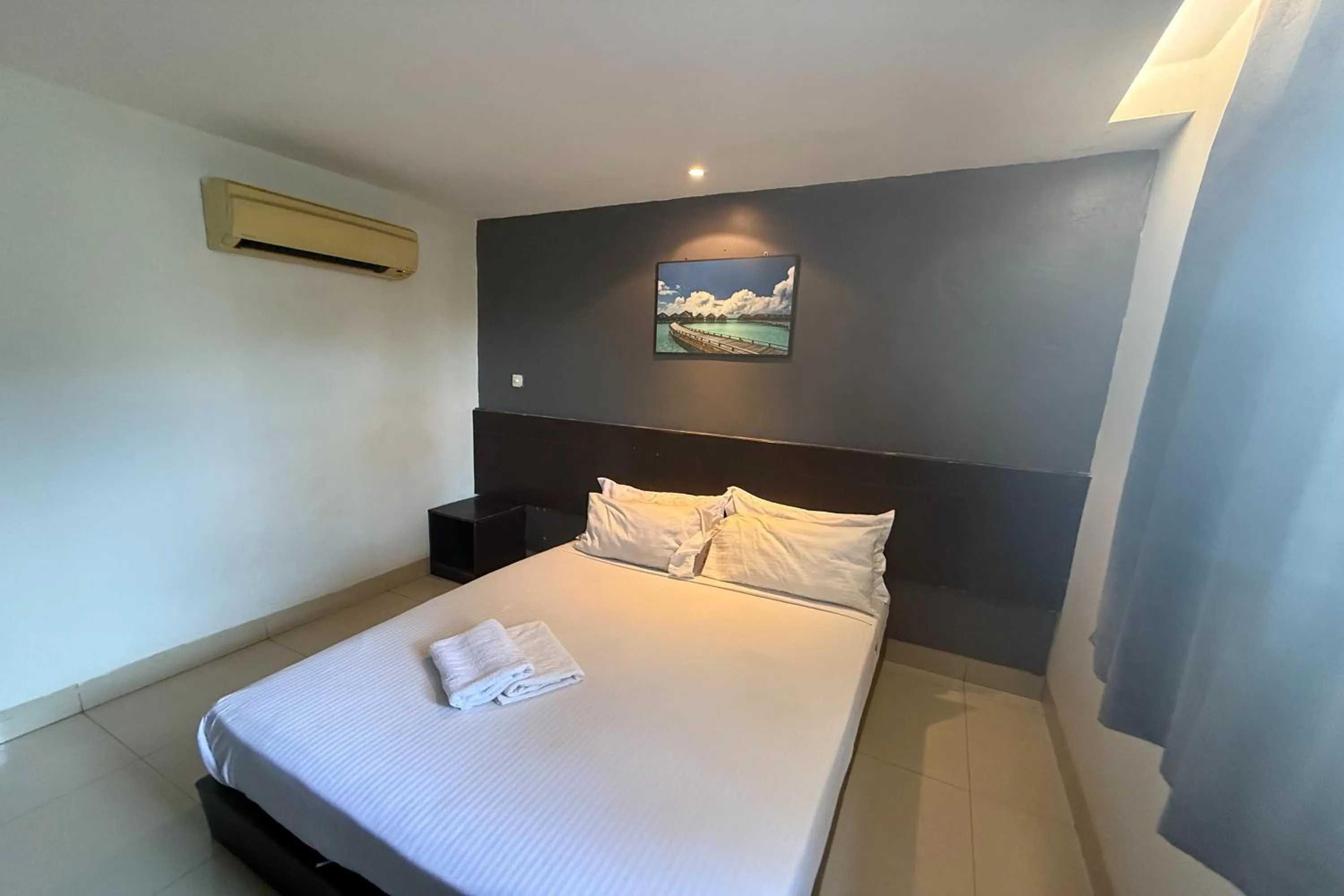 Bed in Tiong Nam Hotel