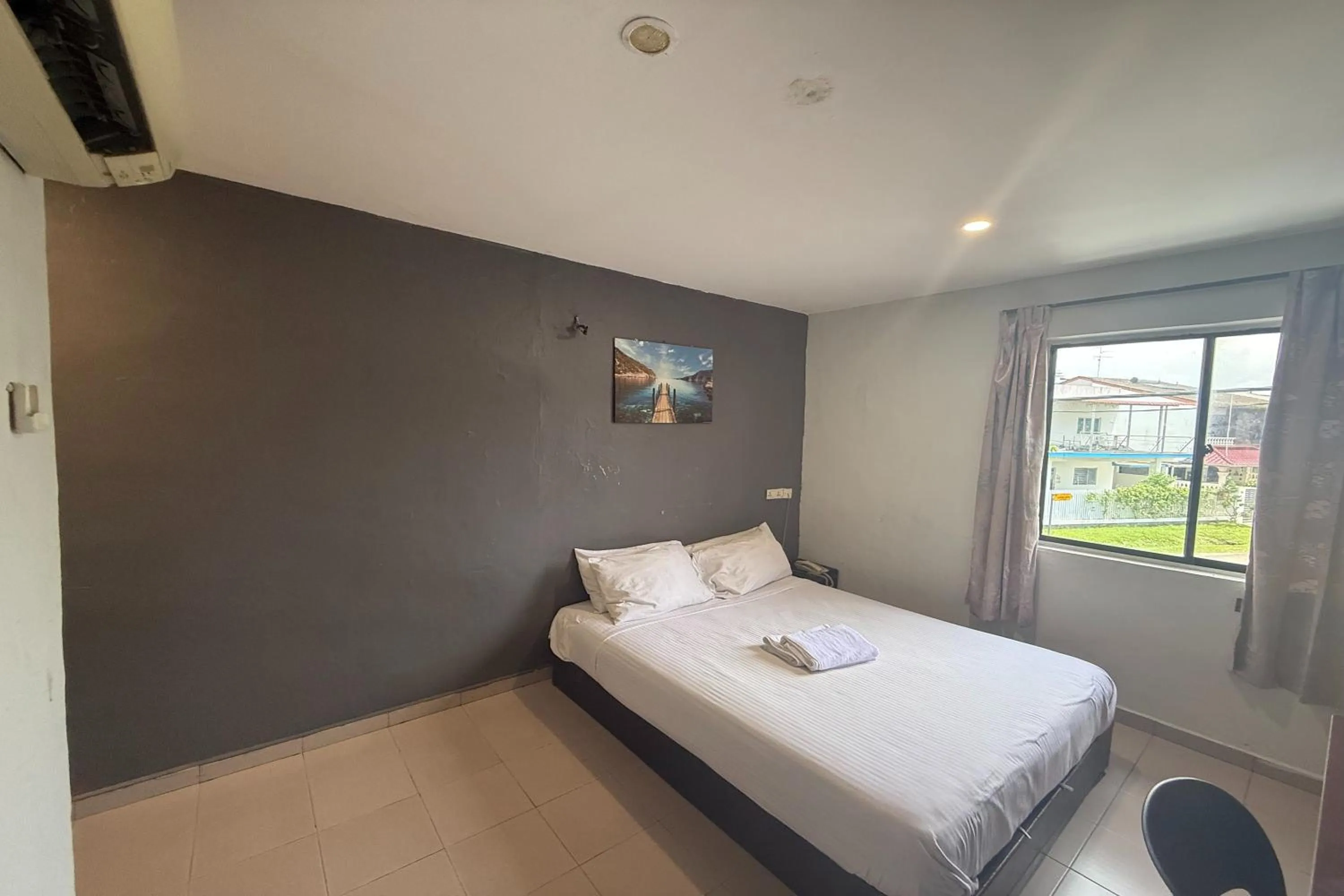 Bed in Tiong Nam Hotel