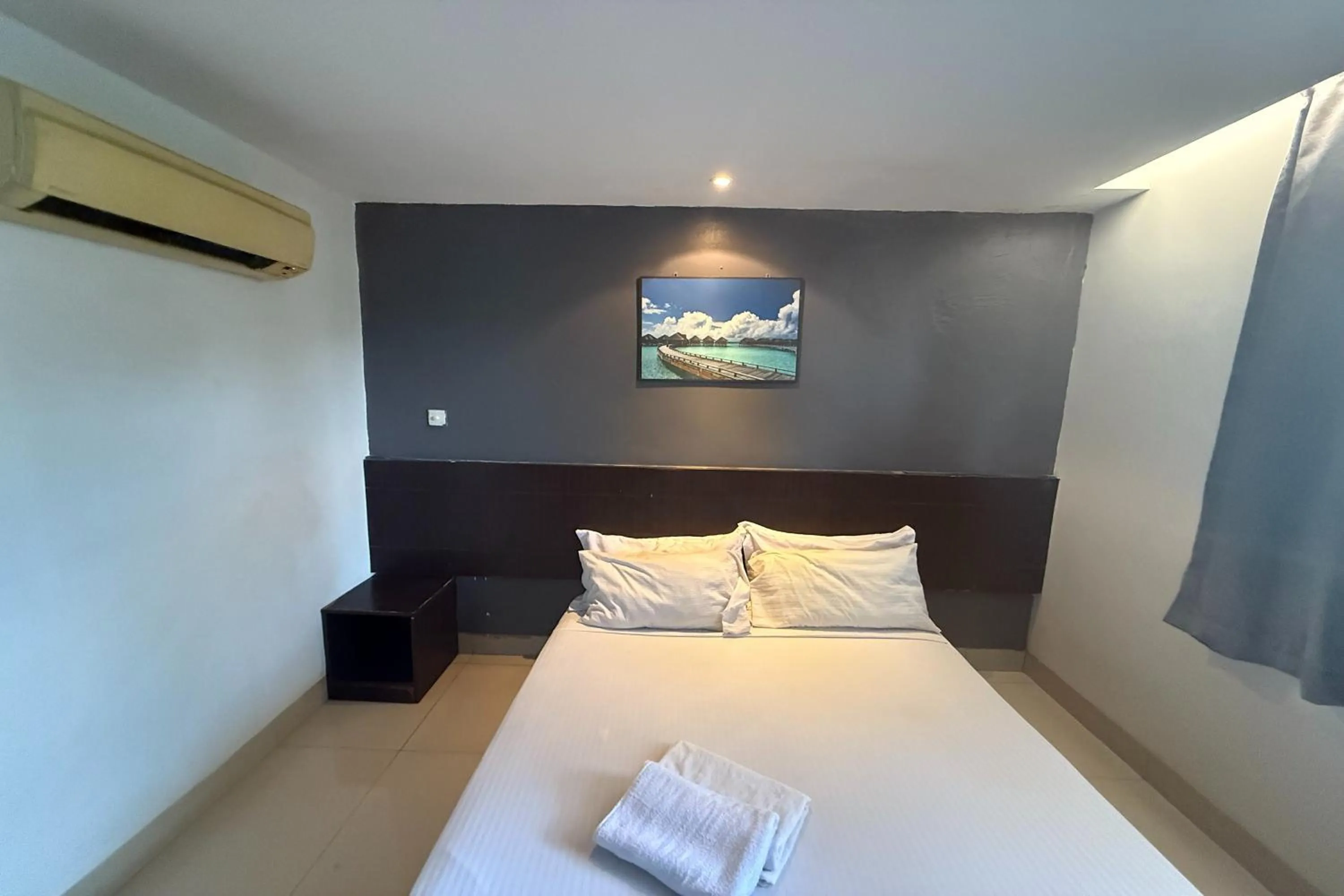 Bed in Tiong Nam Hotel