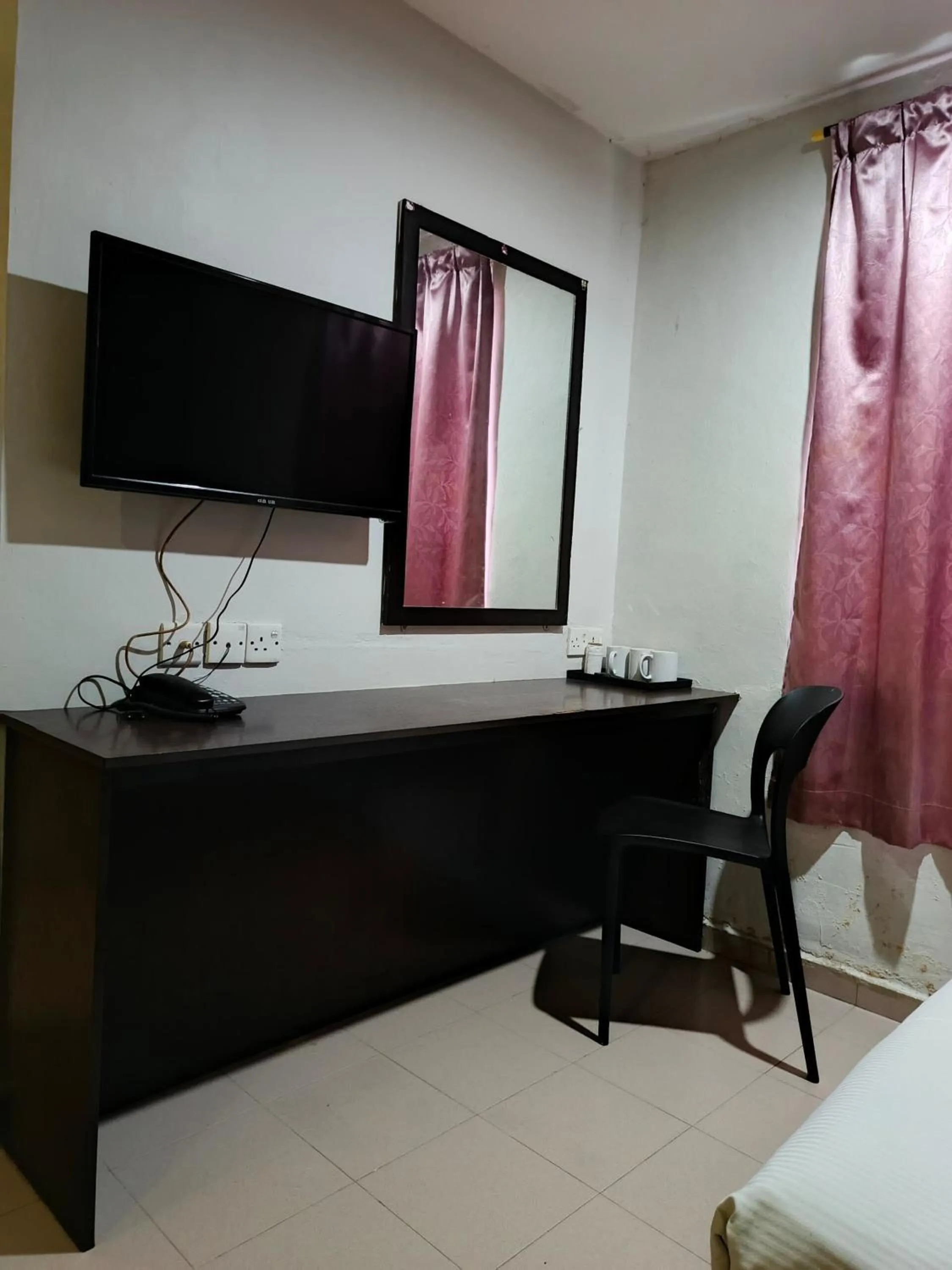 Bed in Tiong Nam Hotel