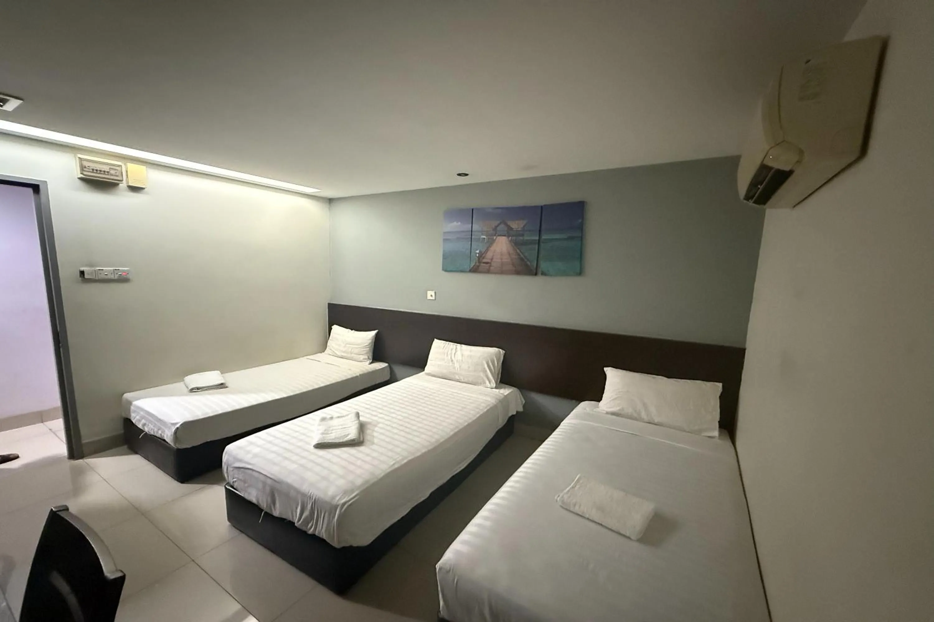 Bed in Tiong Nam Hotel