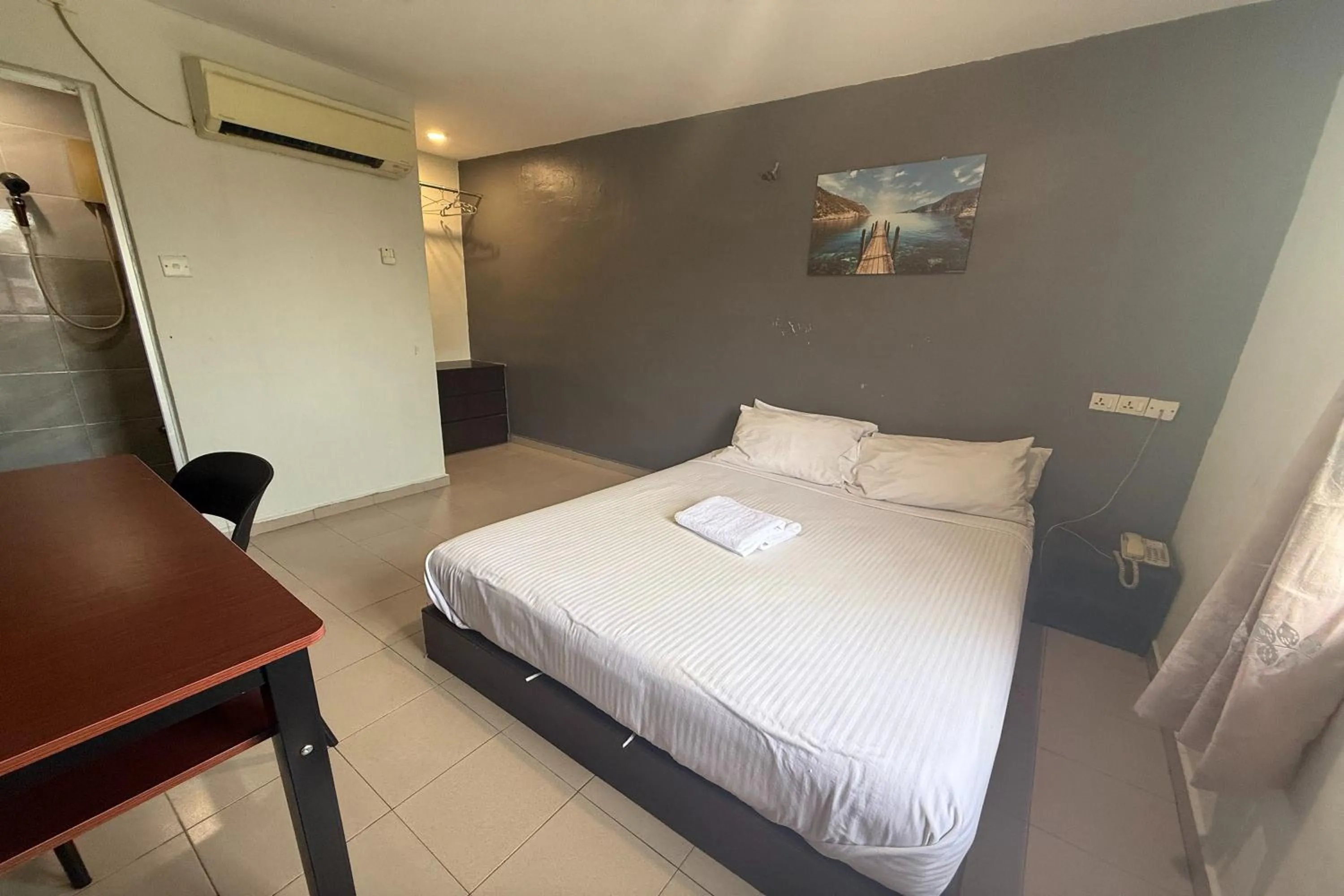 Bed in Tiong Nam Hotel