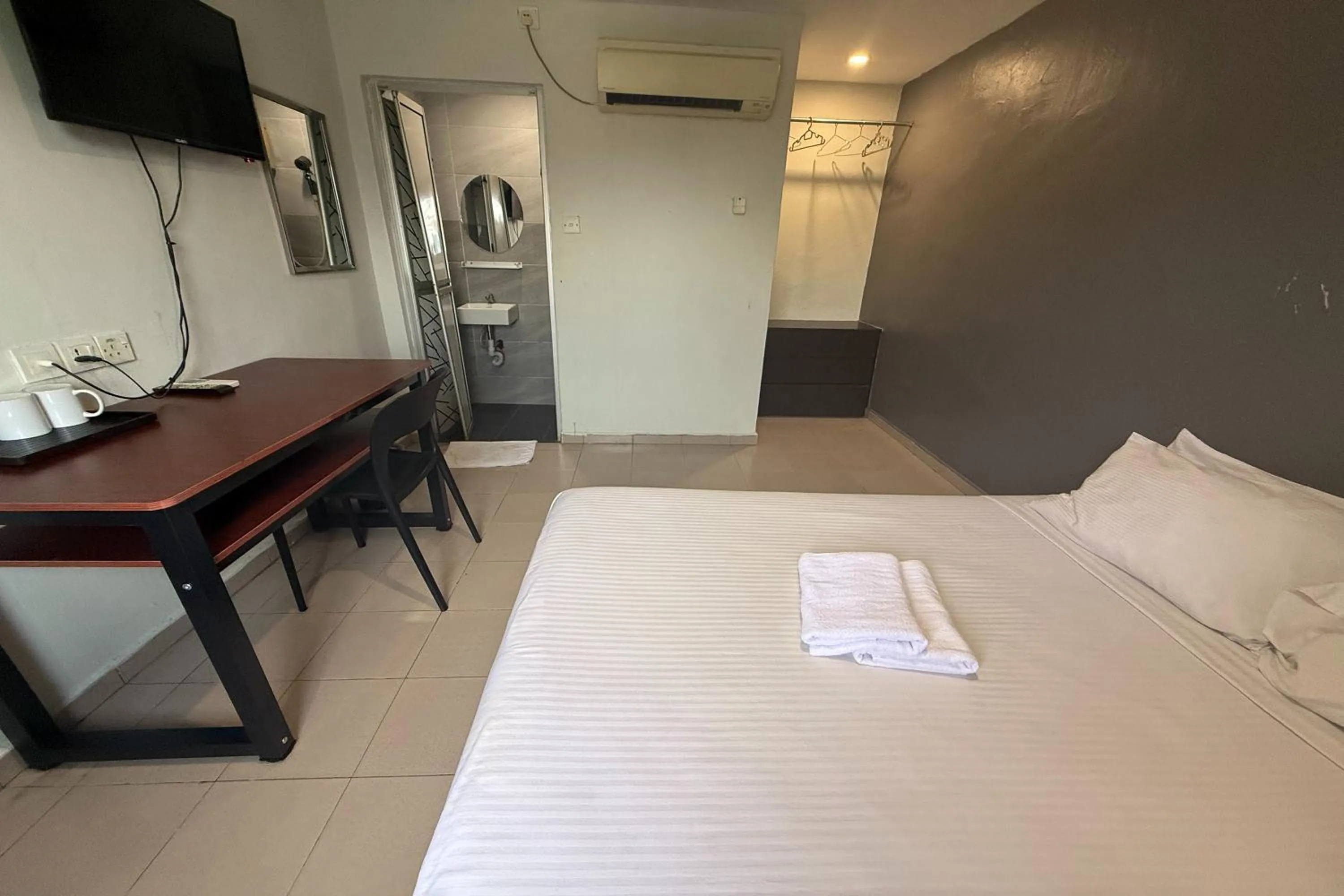 Bed in Tiong Nam Hotel