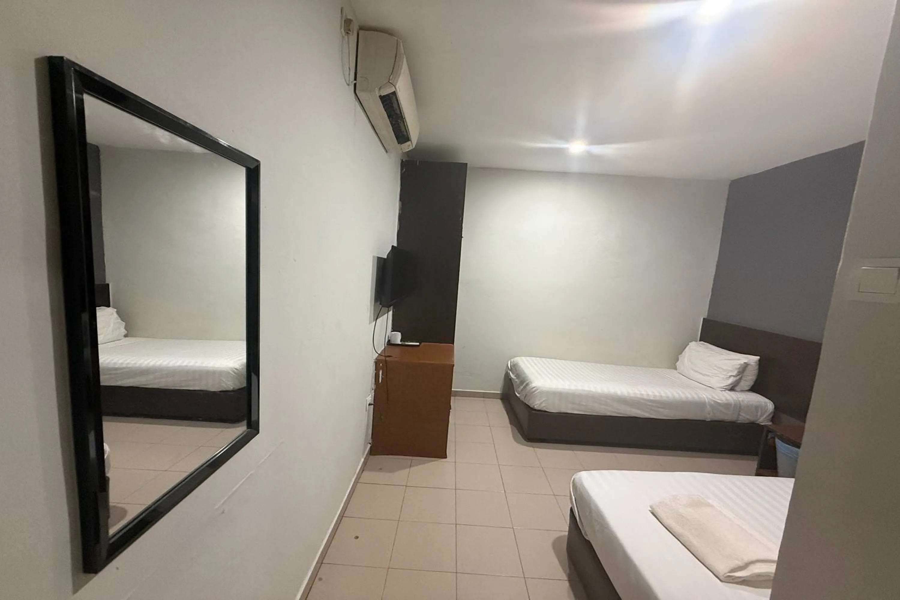 Bed in Tiong Nam Hotel