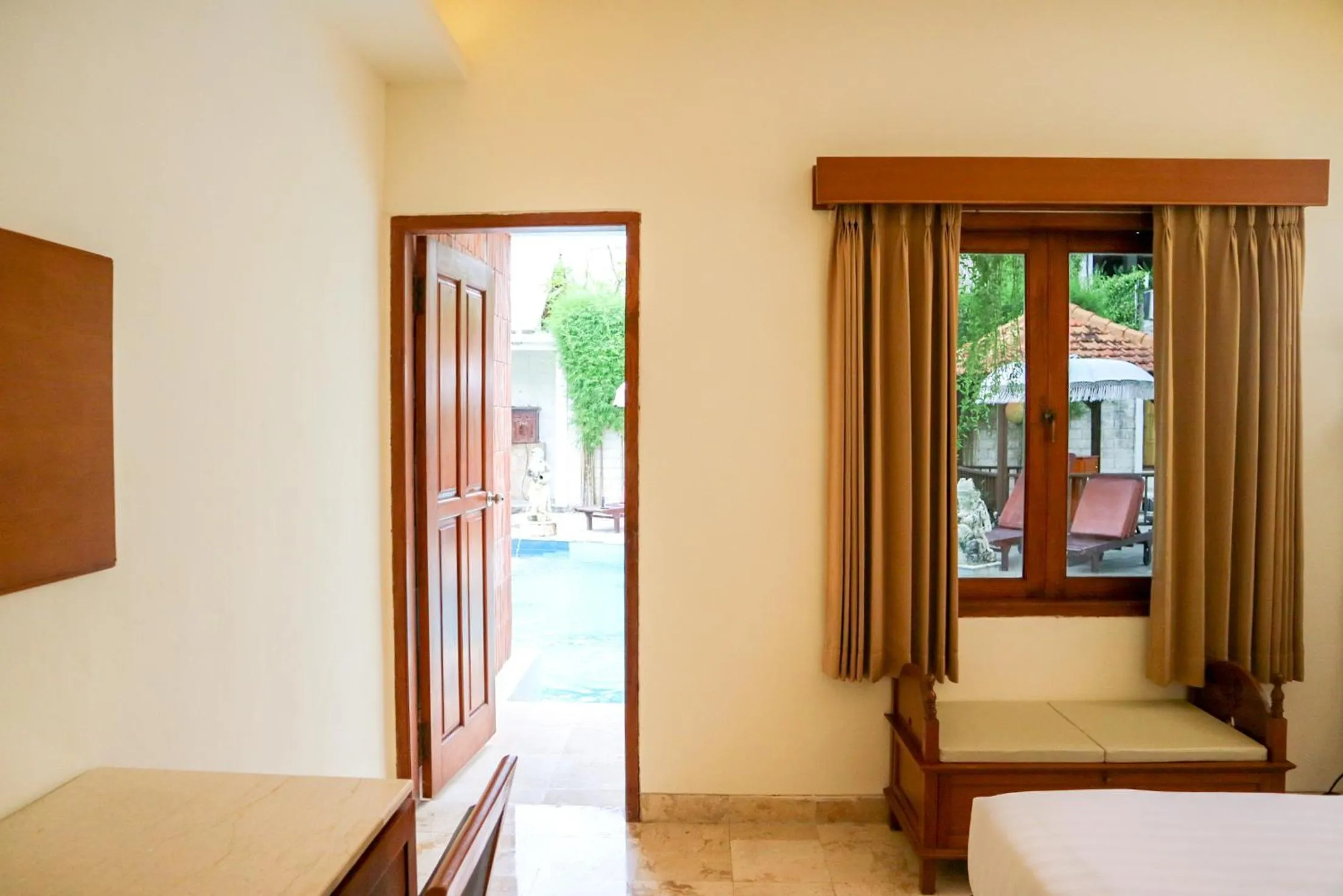 Bed in The Lagoon Bali Pool Hotel and Suites