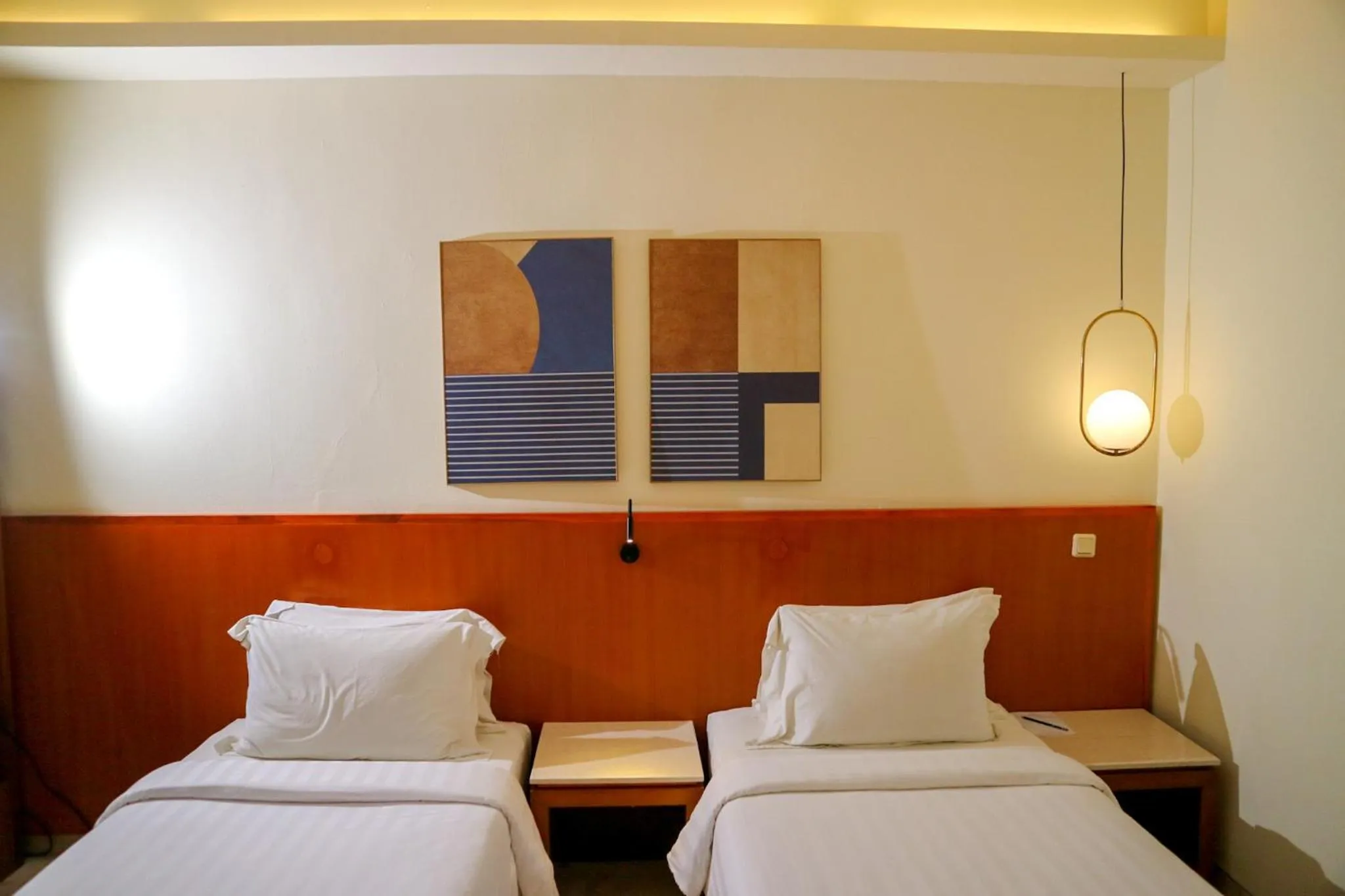 Bed in The Lagoon Bali Pool Hotel and Suites