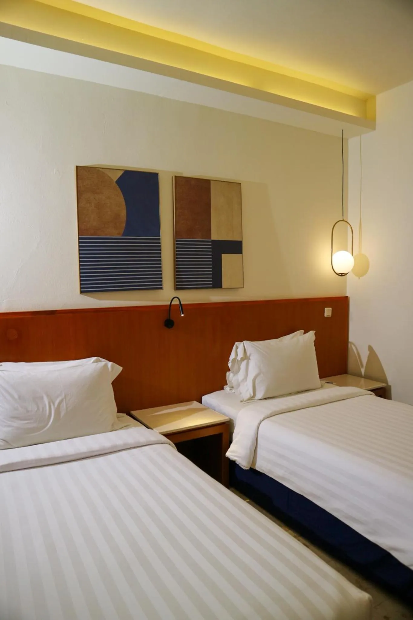 Bed in The Lagoon Bali Pool Hotel and Suites