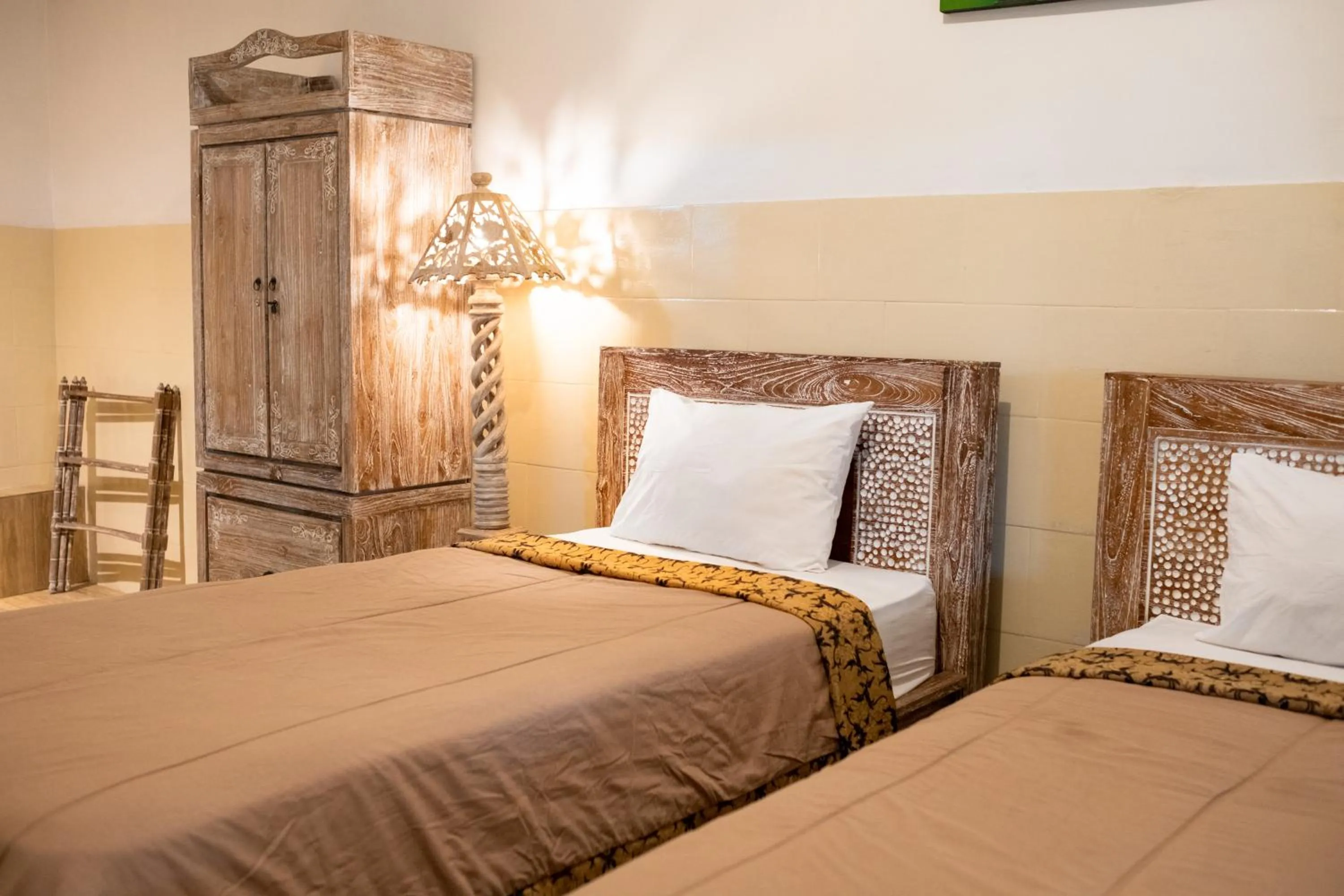 Bed in Uma Shanty Homestay