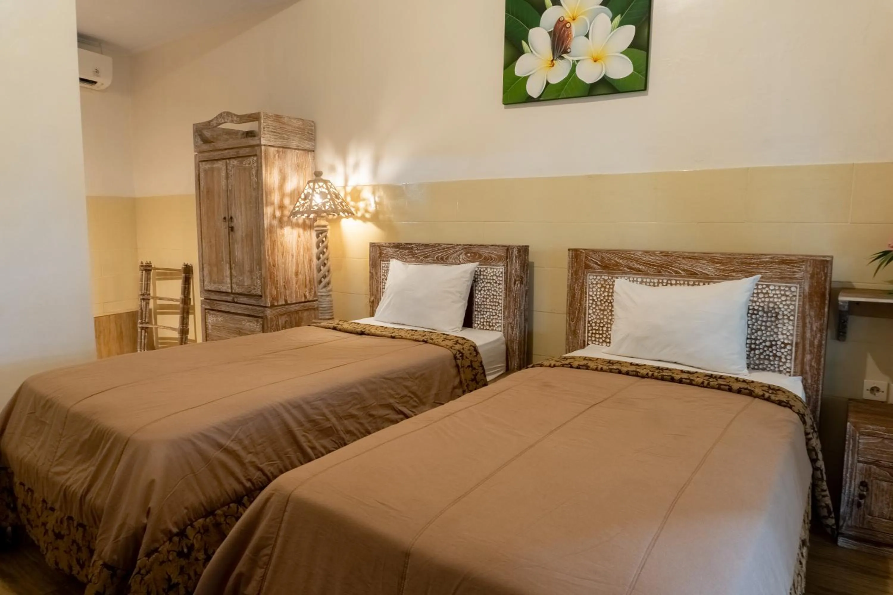 Bed in Uma Shanty Homestay