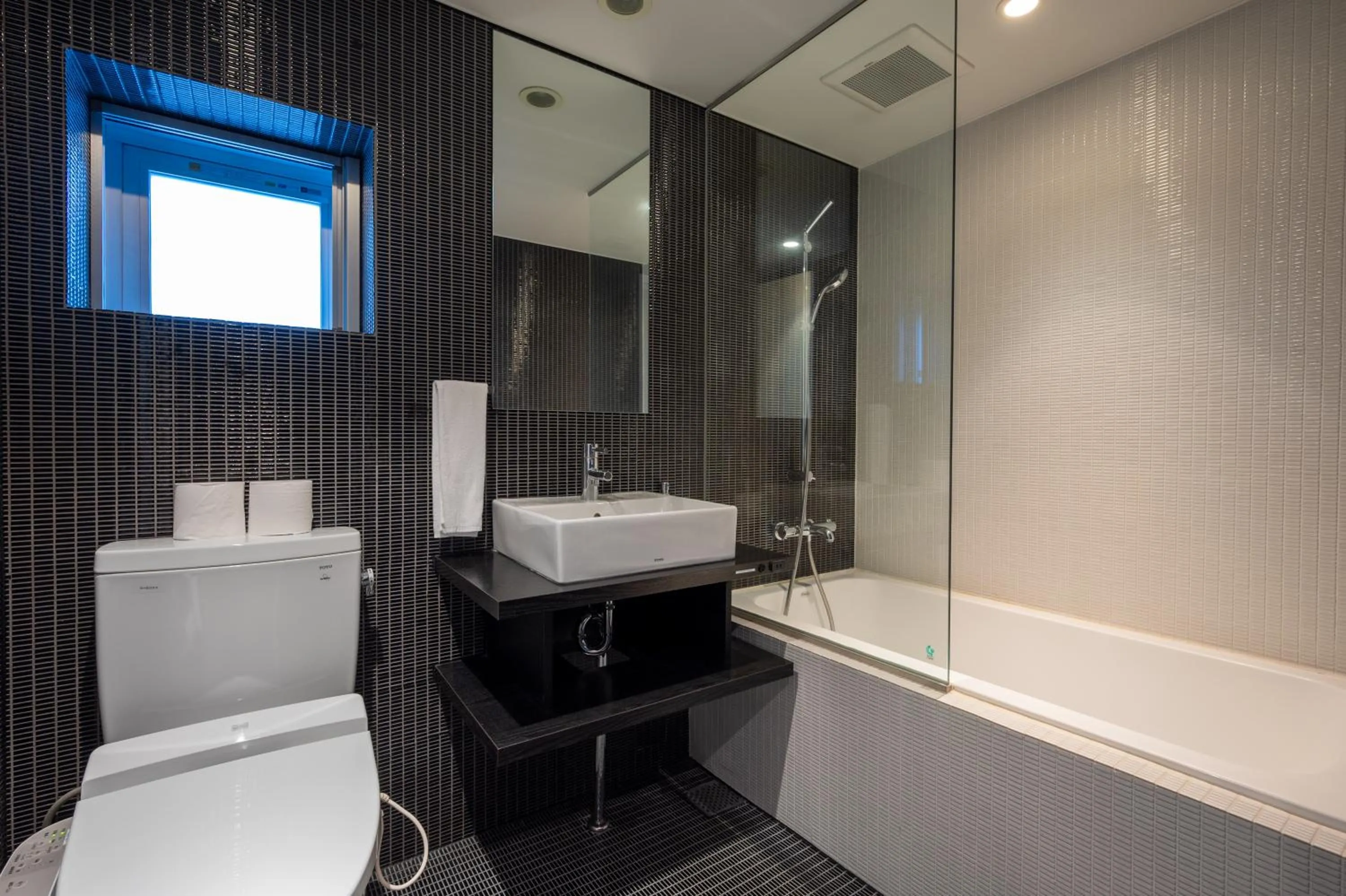 Bathroom in Kira Kira Suites by H2 Life