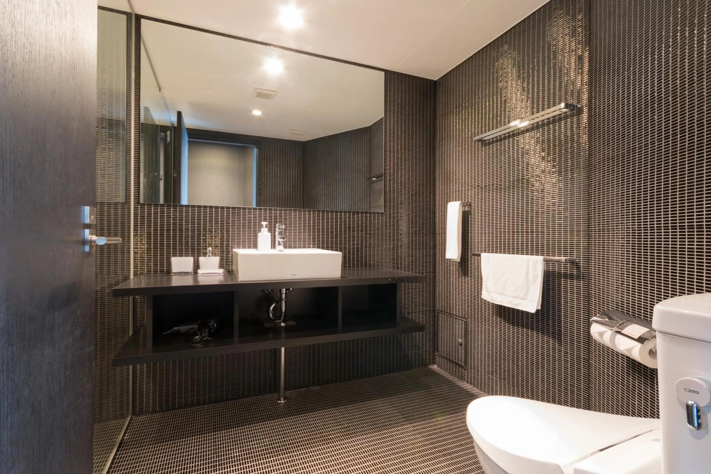 Bathroom in Kira Kira Suites by H2 Life