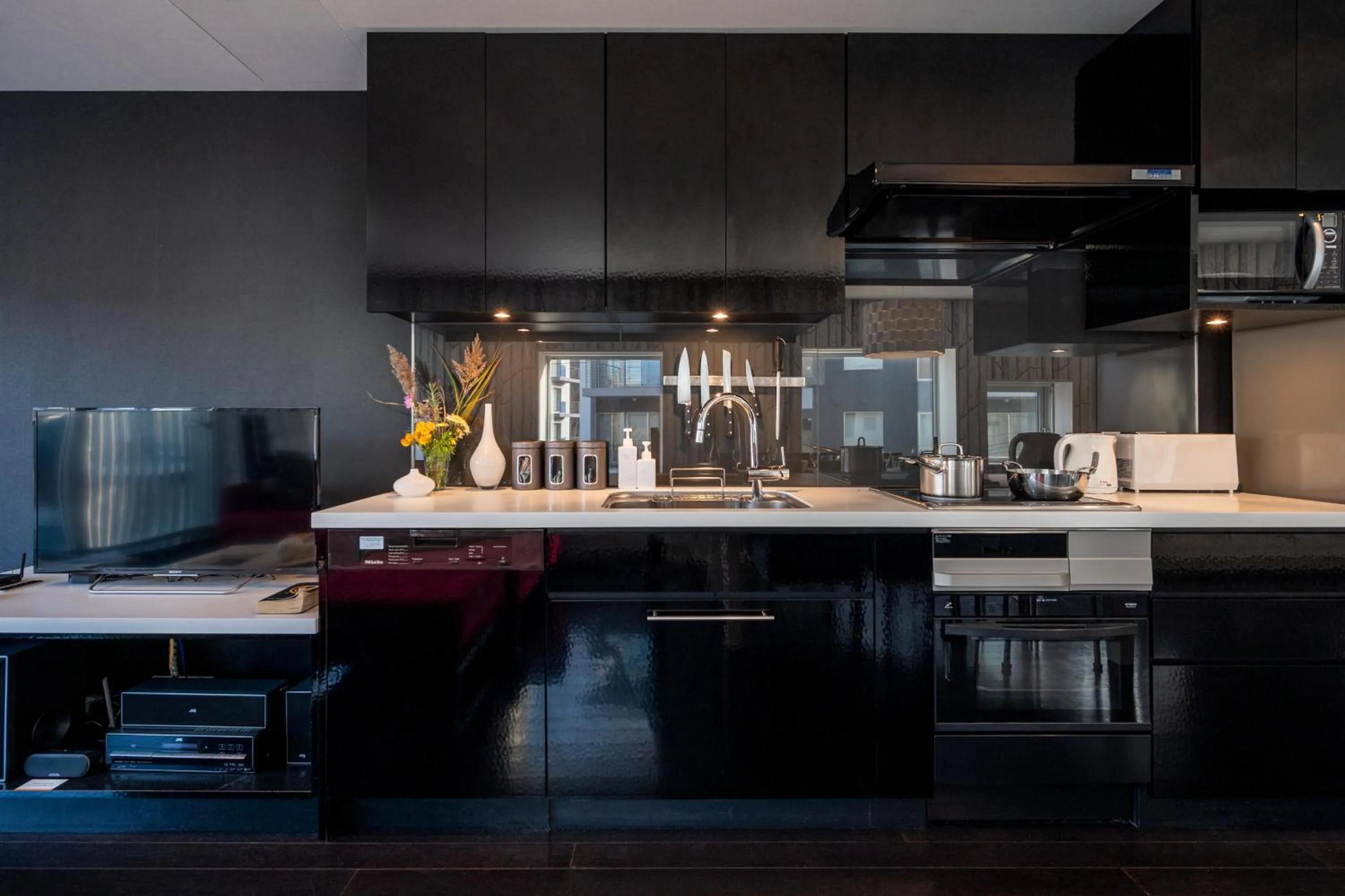 Kitchen or kitchenette in Kira Kira Suites by H2 Life