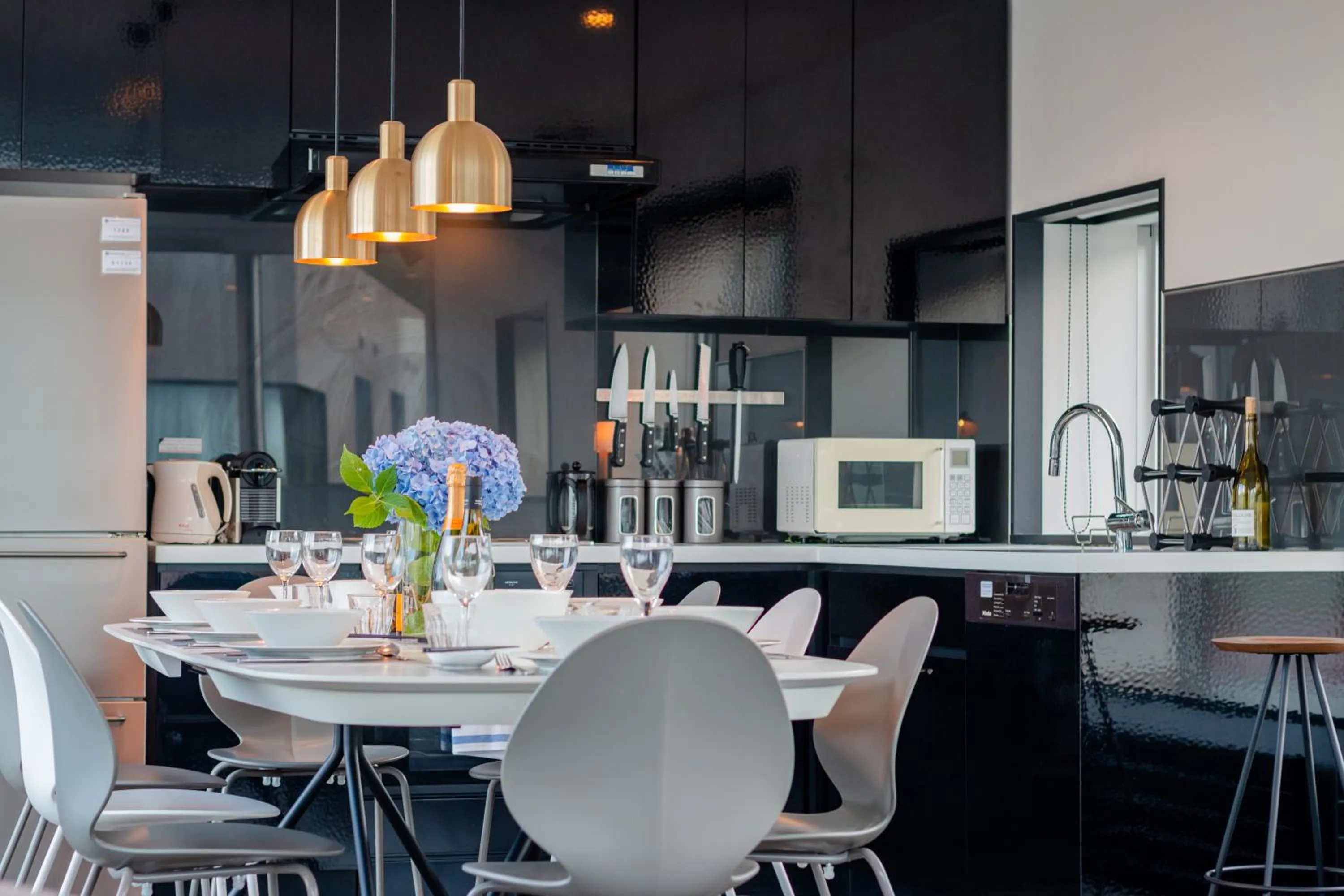 Kitchen or kitchenette in Kira Kira Suites by H2 Life