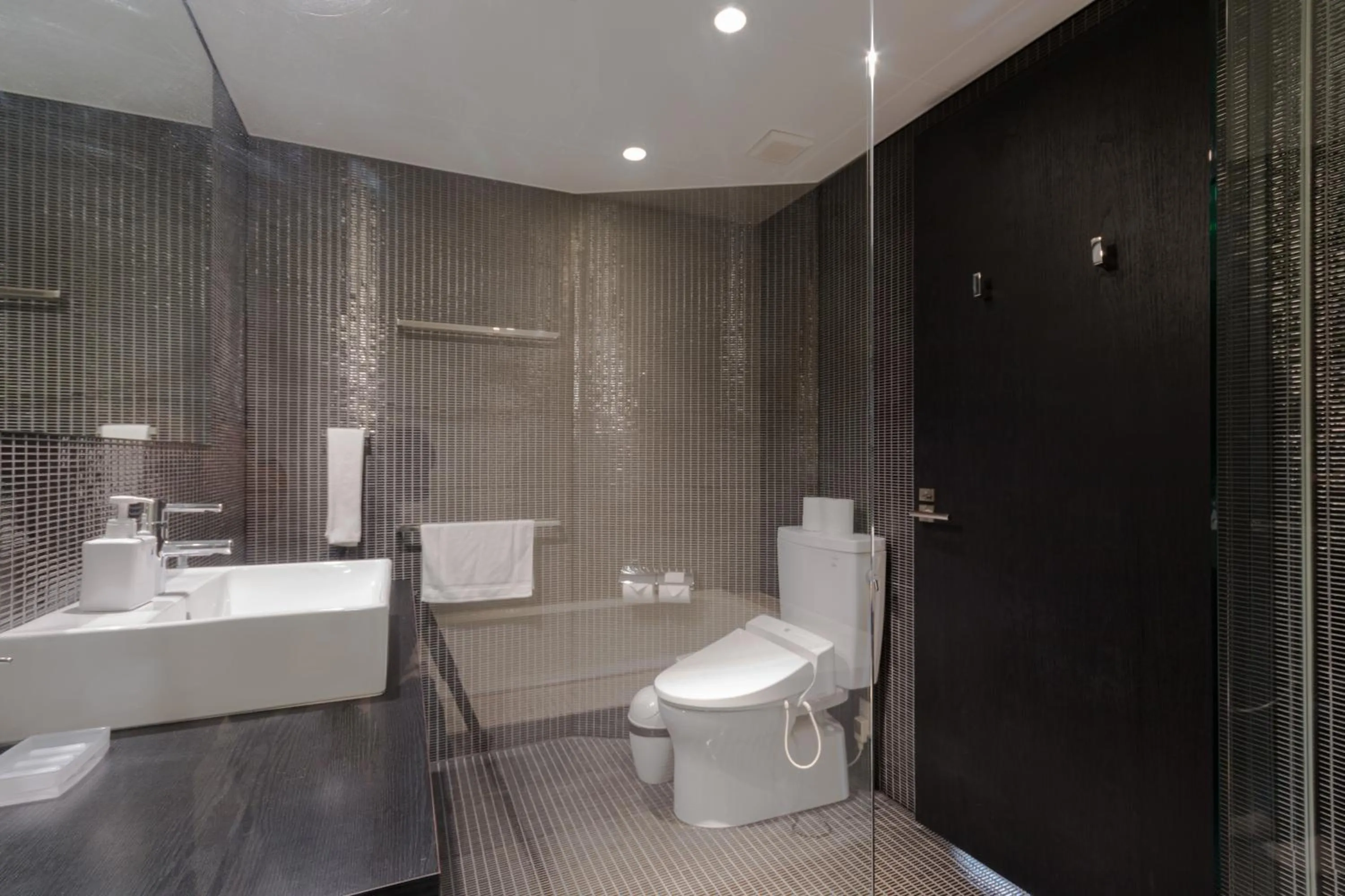 Bathroom in Kira Kira Suites by H2 Life