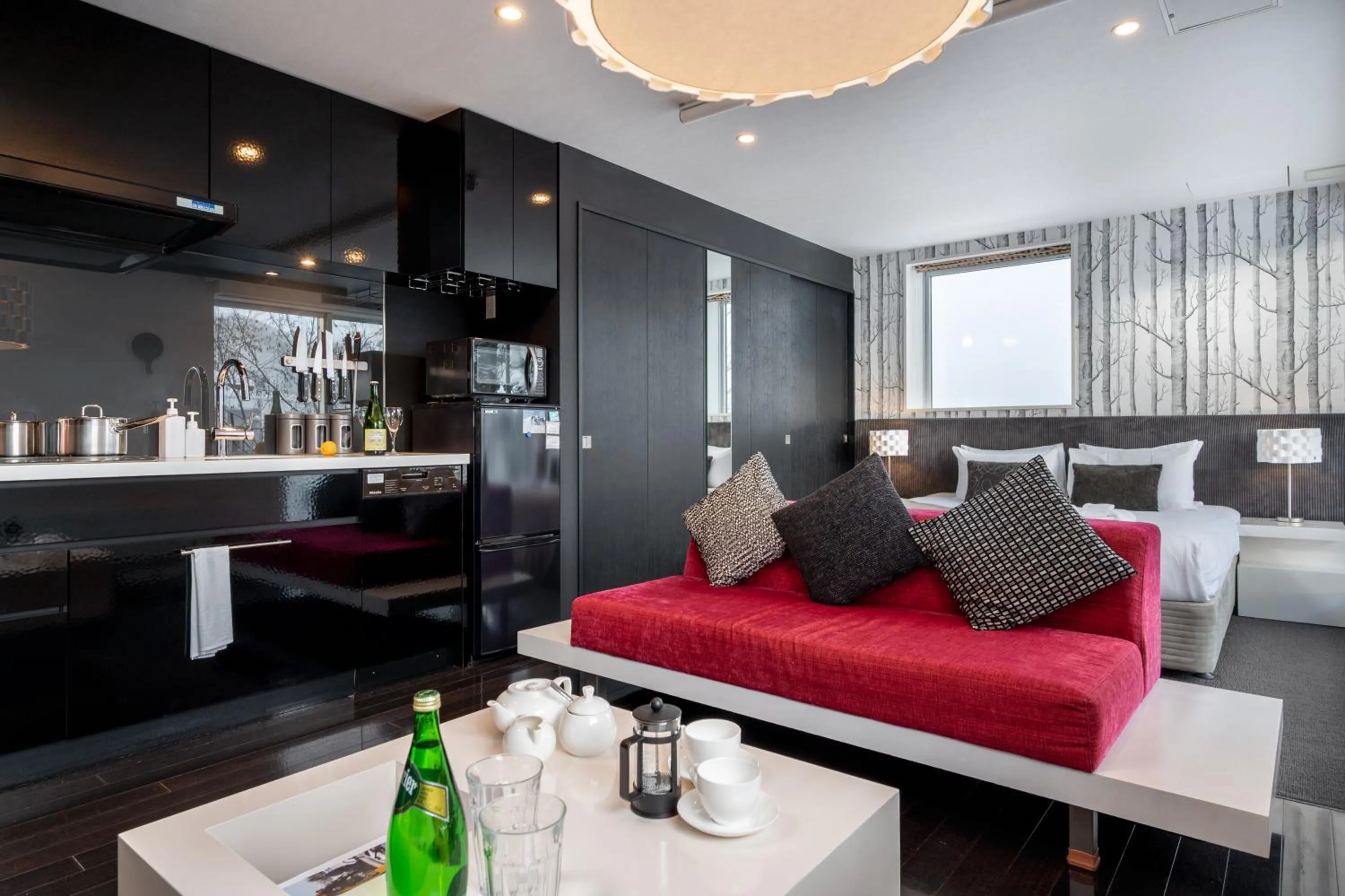 Seating area in Kira Kira Suites by H2 Life