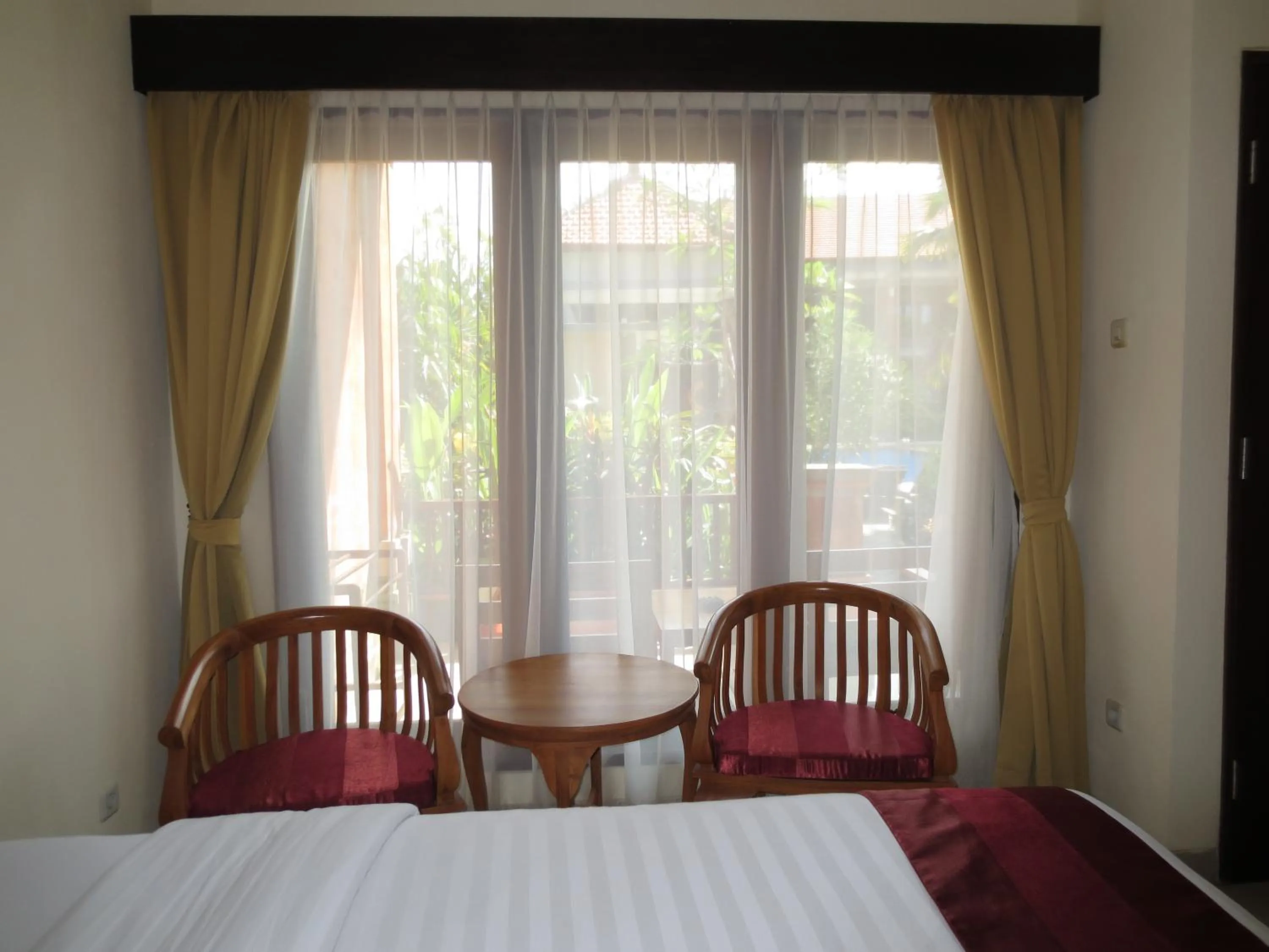 Photo of the whole room, Bed in Swastika Bungalows