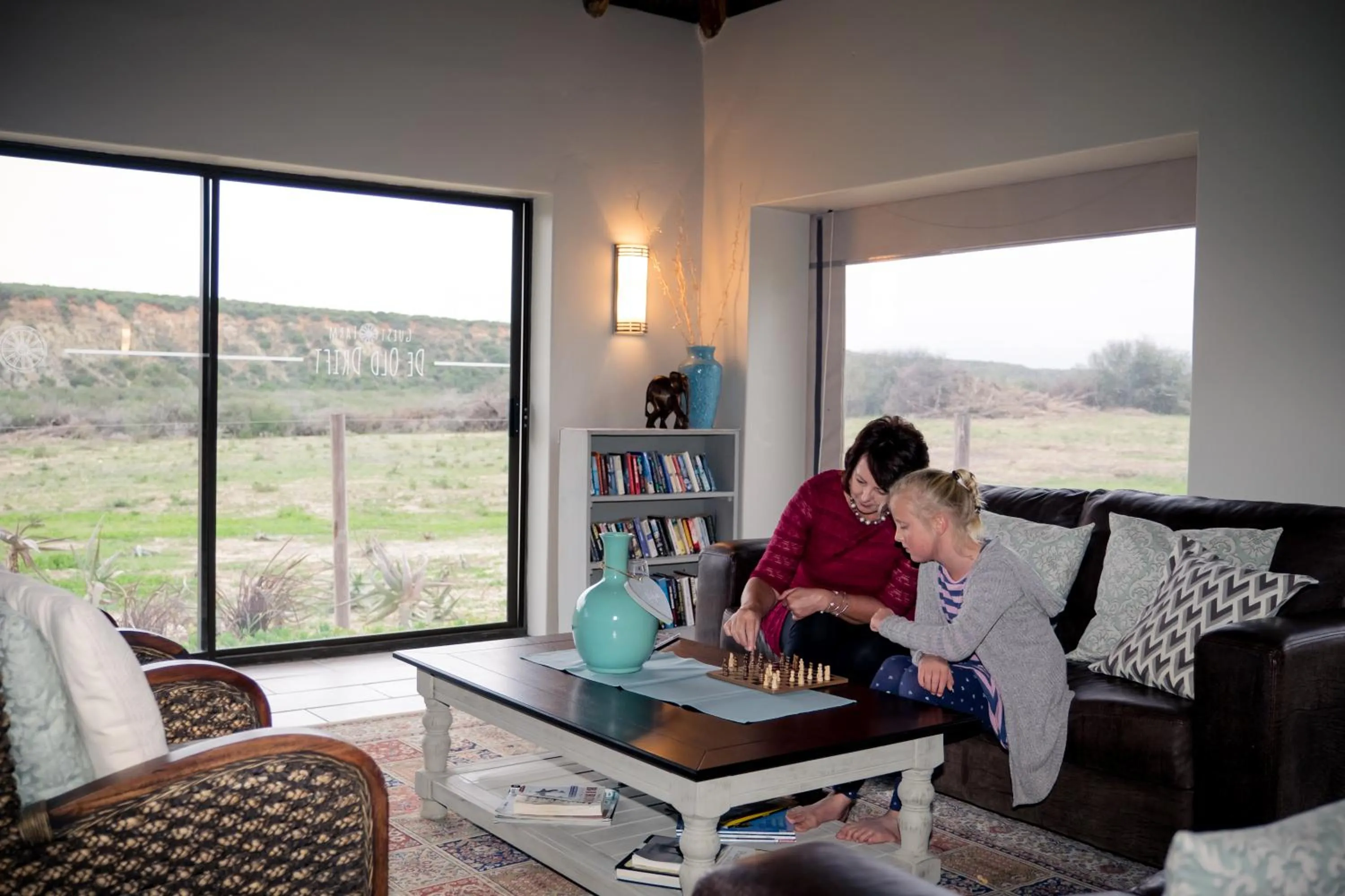 Communal lounge/ TV room in De Old Drift Guest Farm