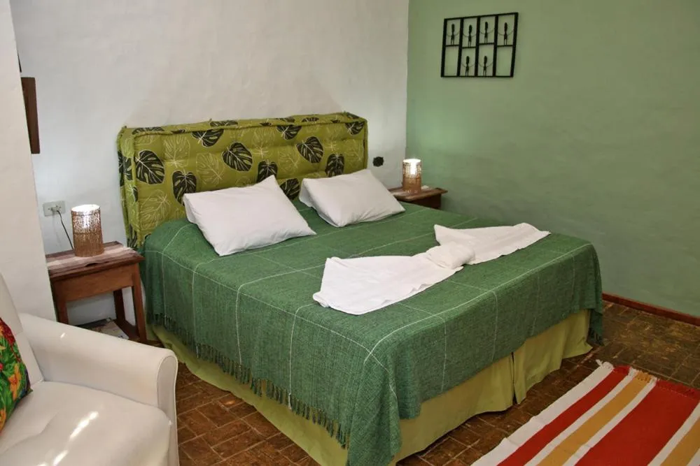 Bed in Pousada Recanto da Villa
