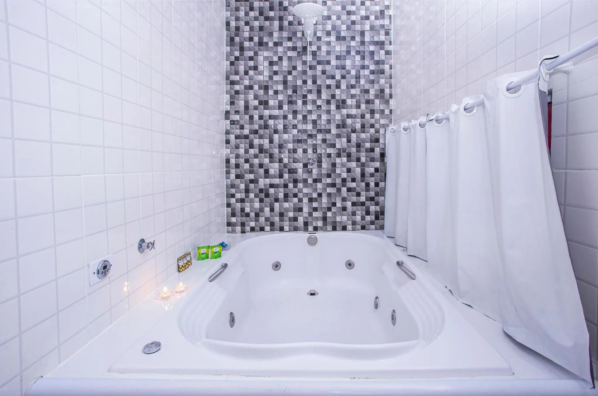 Shower in Pousada Recanto da Villa